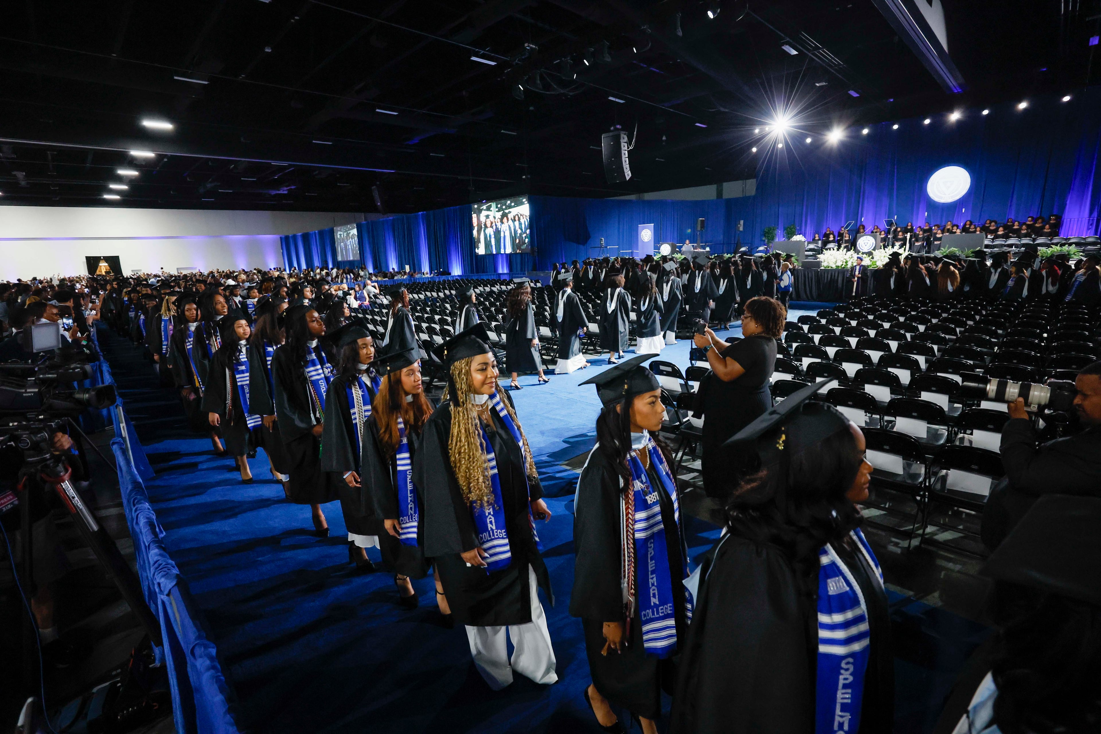 Students process at the start of the Spelman College Commencement ceremony at the Georgia International Convention Center in College Park on Sunday, May 17, 2026. (Miguel Martinez/AJC)