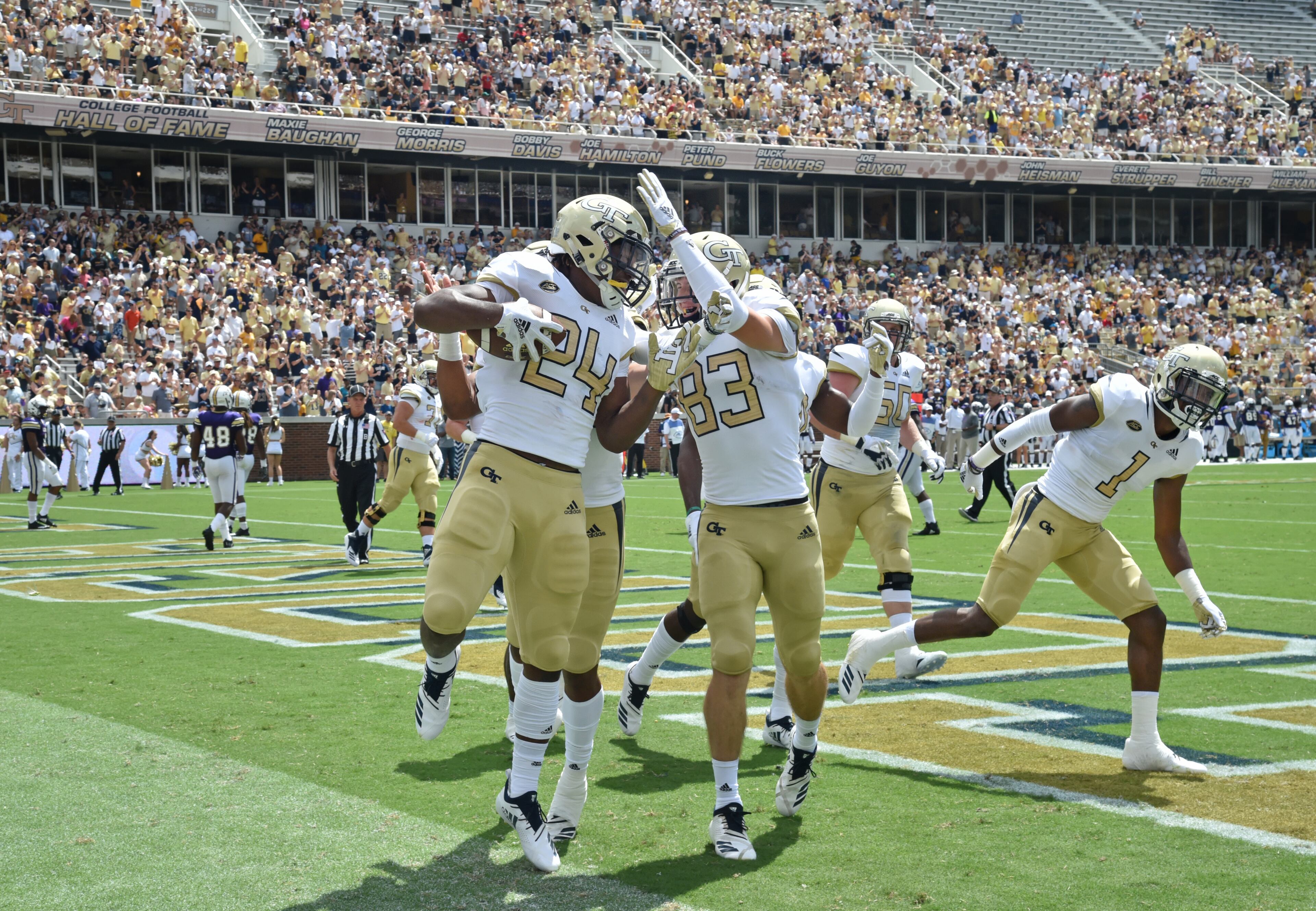 September 1, 2018 Atlanta - Georgia Tech running back Jordan Mason (24) celebrates with teammates after he scored a touchdown in the first half of the Georgia Tech home opener at Bobby Dodd Stadium on Saturday, September 1, 2018. HYOSUB SHIN / HSHIN@AJC.COM