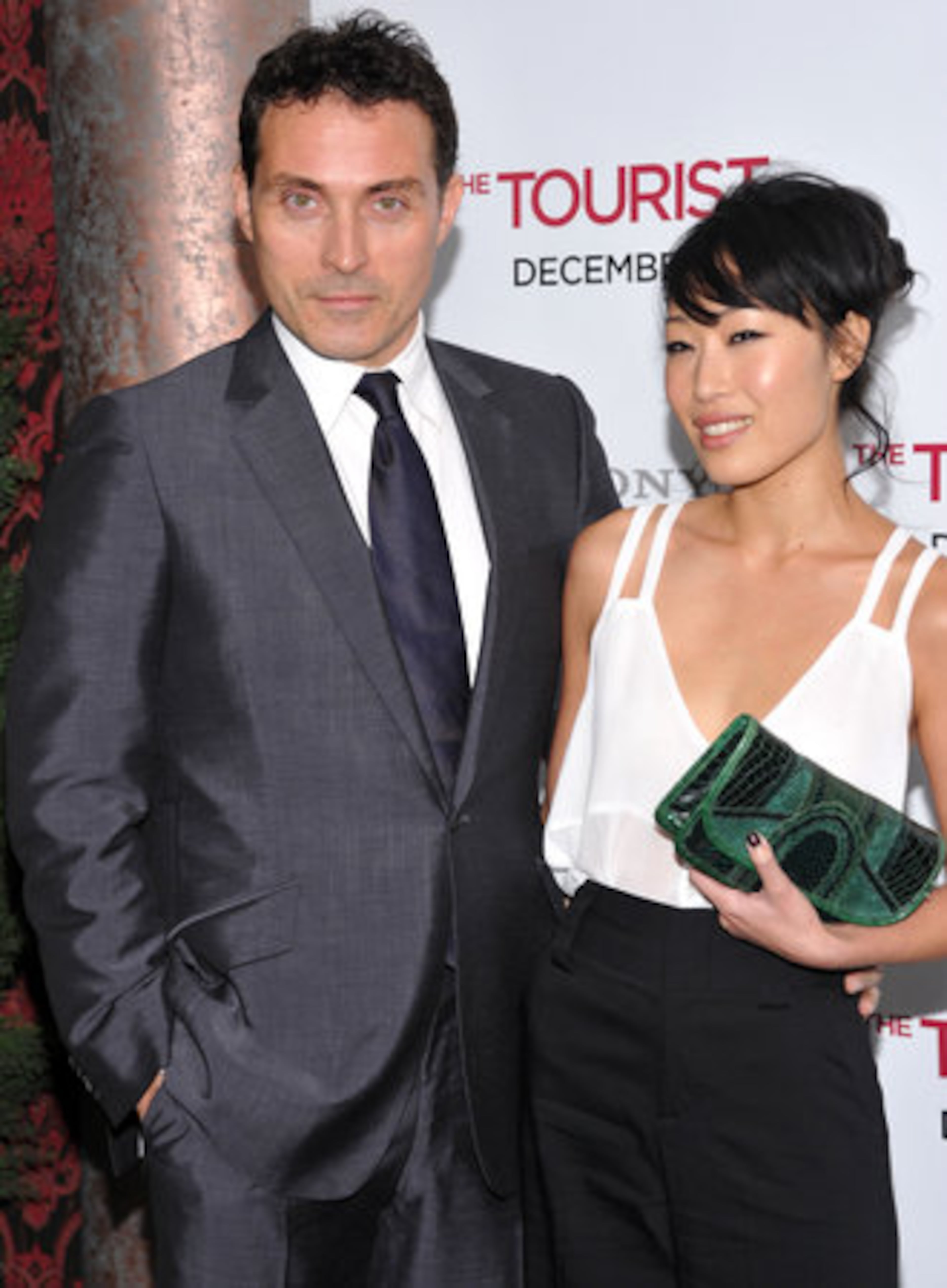 Actor Rufus Sewell and guest attend the world premiere of "The Tourist" at the Ziegfeld Theatre.