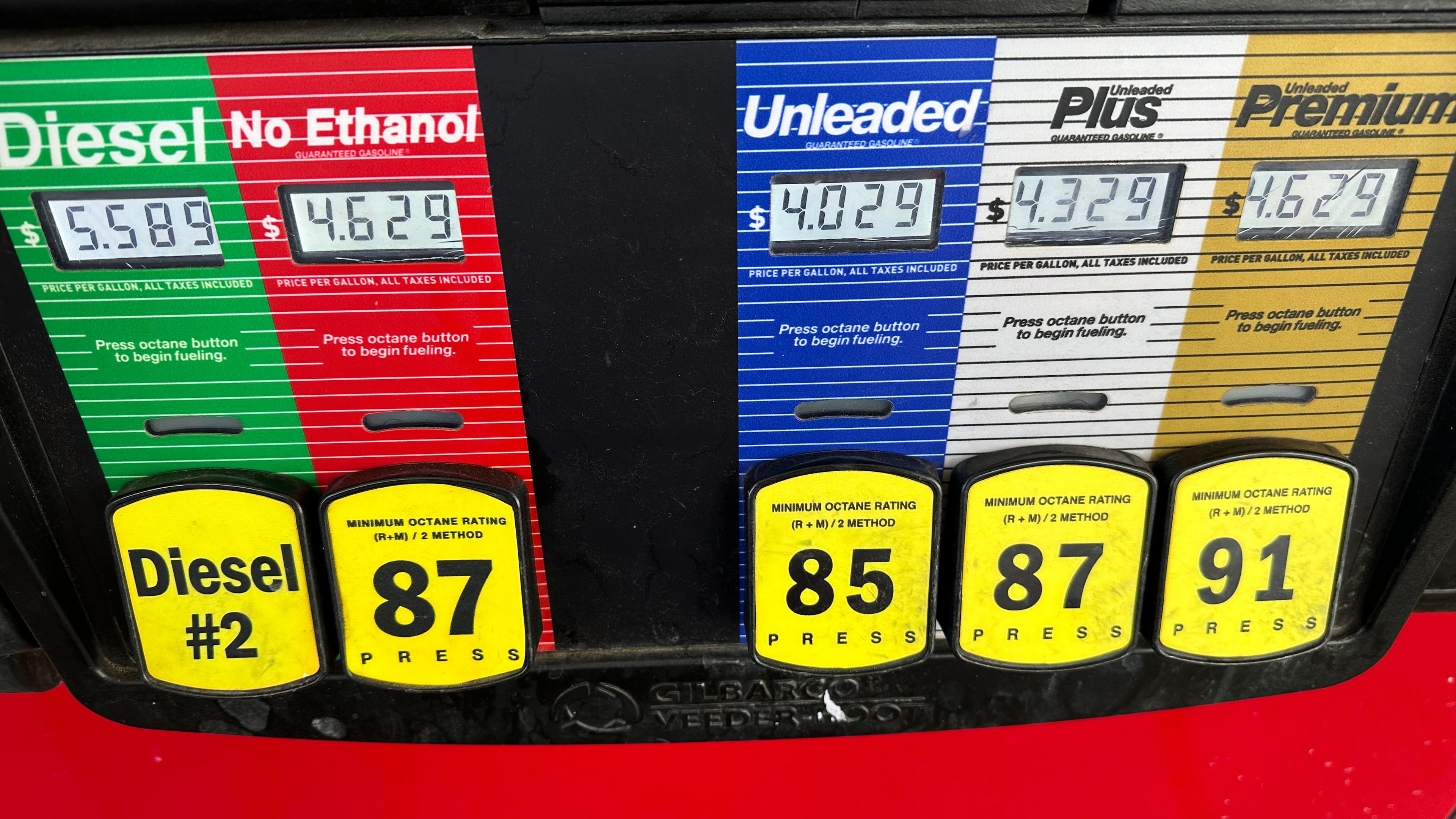 The per-gallon prices are displayed above the various grades of fuel available at a pump at a QuikTrip gasoline station Tuesday, Sept. 15, 2026, in Greenwood Village, Colo. (AP Photo/David Zalubowski)