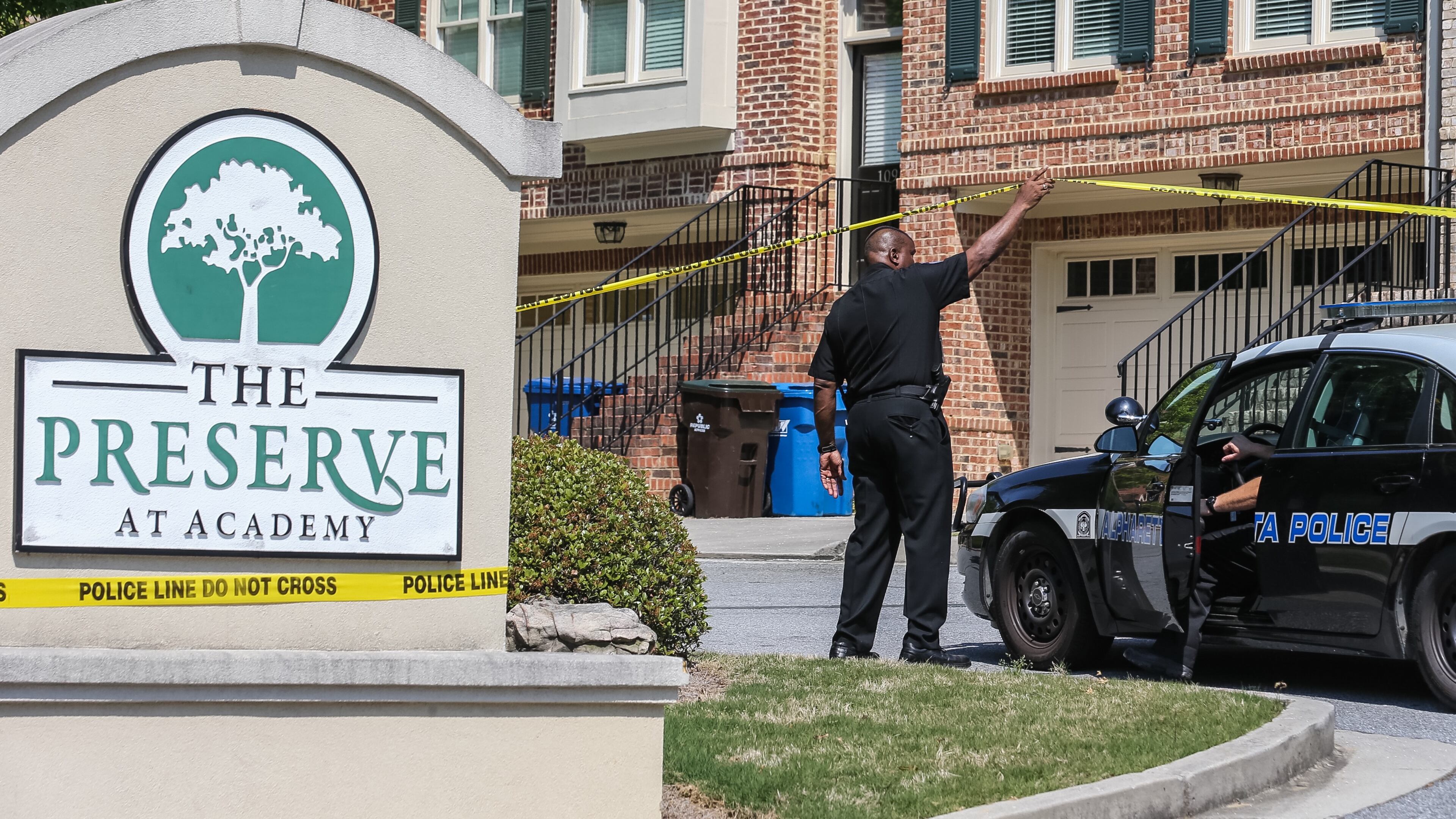 Police were on the scene of a shooting at The Preserve at Academy in Alpharetta. A call came in about 9:50 a.m. Thurs., April 21, 2016, about an incident at the townhome community. JOHN SPINK / JSPINK@AJC.COM