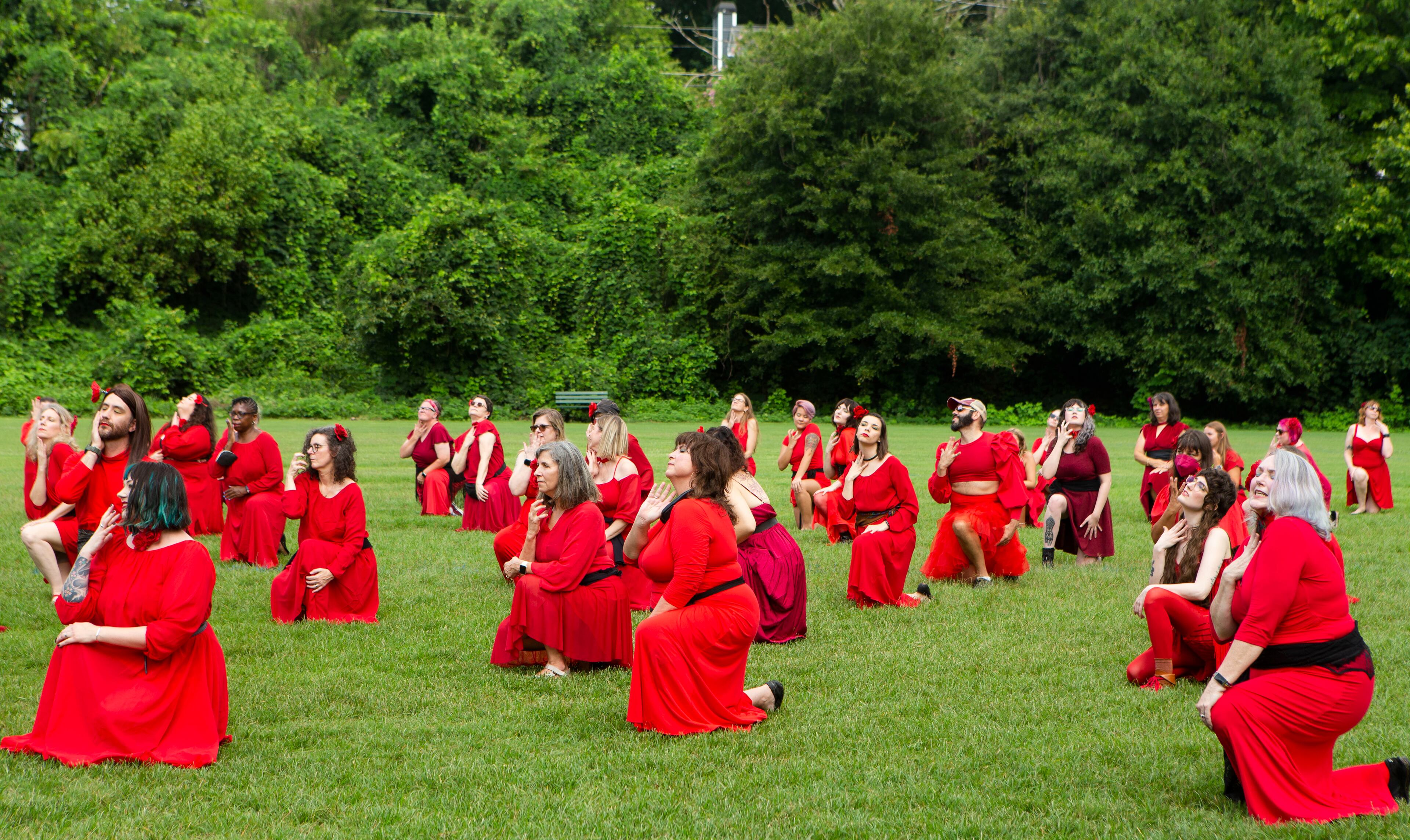 Kate Bush fans wait in place for the starting cue for a group dance to celebrate the seventh annual international "Most Wuthering Heights Day Ever," on Saturday, July 30, 2022, in Candler Park in Atlanta. The event celebrates Kate Bush's 1978 song "Wuthering Heights" with events in more than 40 cities around the world. CHRISTINA MATACOTTA FOR THE ATLANTA JOURNAL-CONSTITUTION