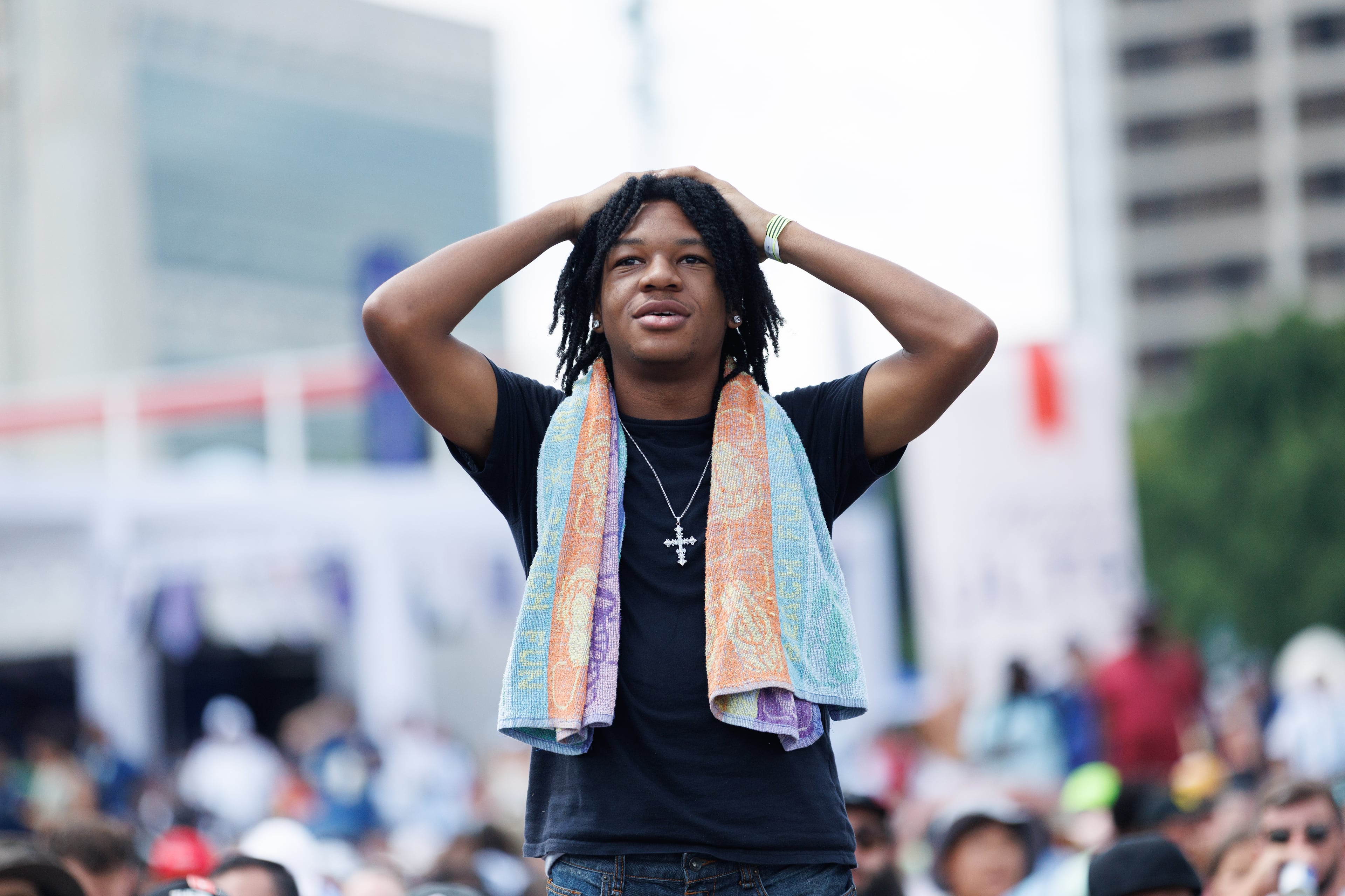 A FIFA Fan Fest attendee reacts to a play by Argentina while watching the World Cup game against Egypt on a screen at Centennial Park on Tuesday, July 7, 2026, in Atlanta. Argentina won 3-2. (Estela Muñoz/AJC)