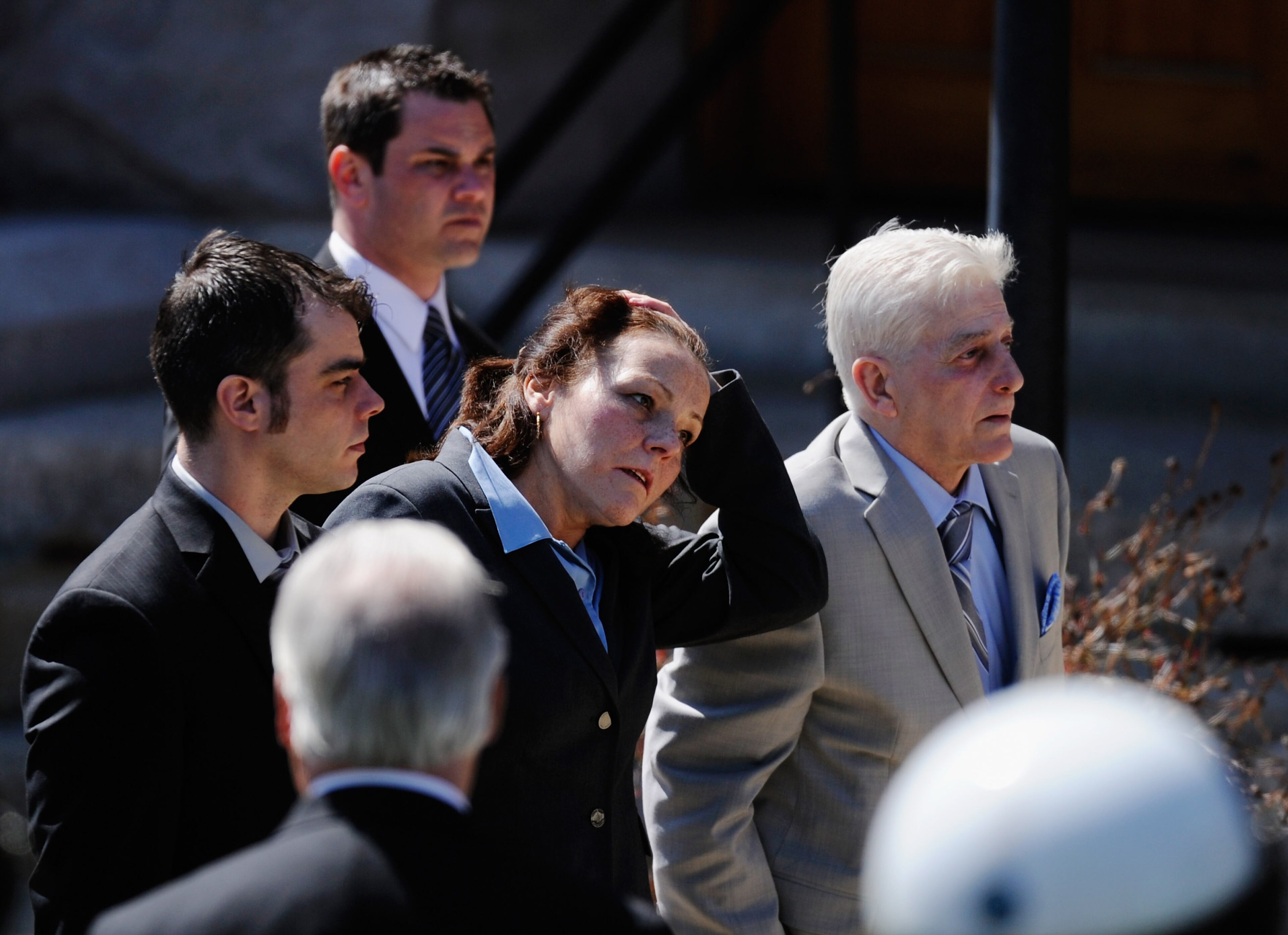 Patty Cambell (C) mother of Krystle Campbell, a victim of the Boston Marathon bombing, arrives with family memebrs to St. Joseph Catholic Church for her funeral on April 22, 2013 in Medford, Massachusetts. A manhunt ended for Dzhokhar A. Tsarnaev, 19, a suspect in the Boston Marathon bombing after he was apprehended on a boat parked on a residential property in Watertown, Massachusetts. His brother Tamerlan Tsarnaev, 26, the other suspect, was shot and killed after a car chase and shootout with police. The bombing, on April 15 at the finish line of the marathon, killed three people and wounded at least 170.