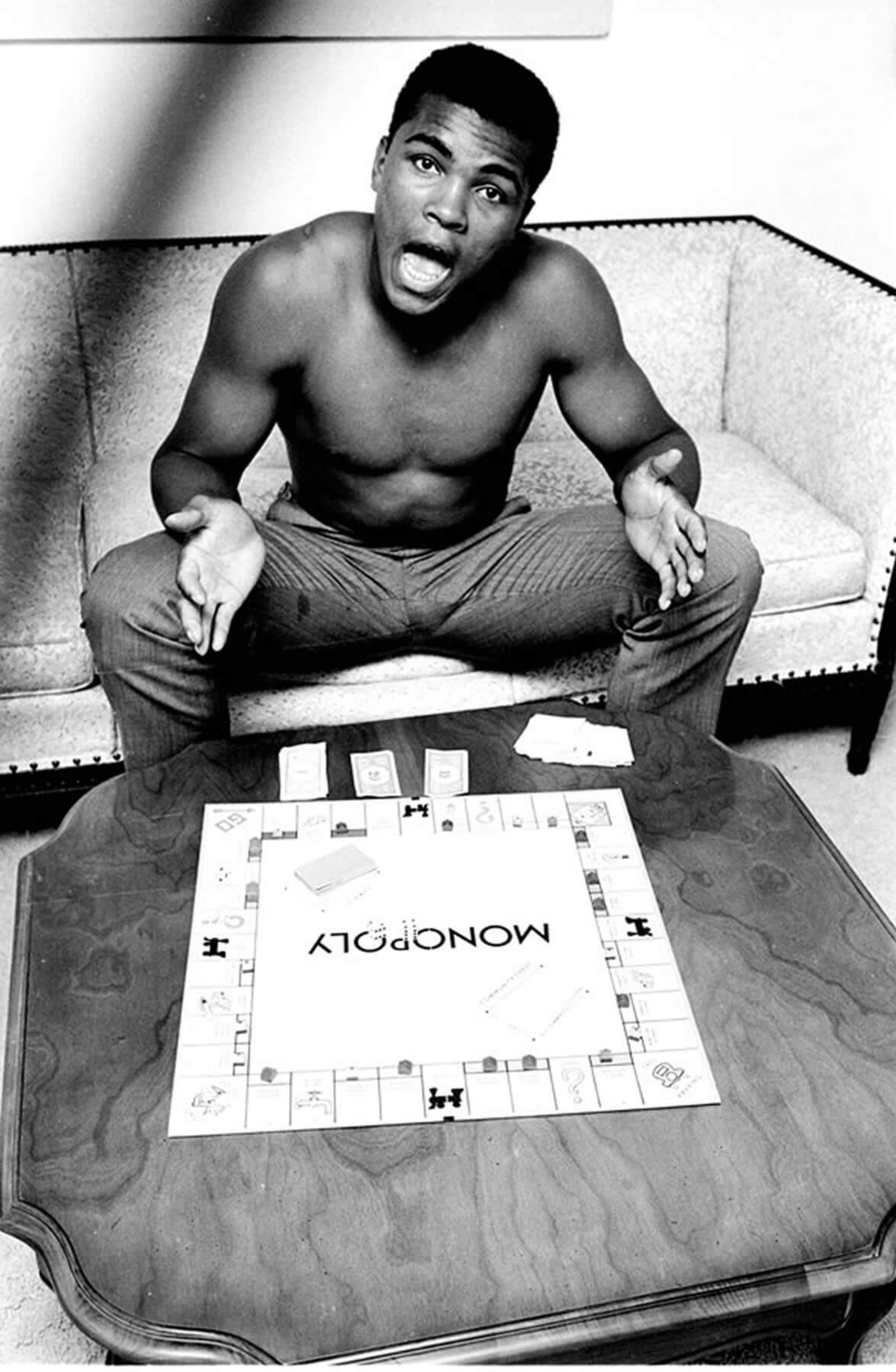 Steve Schapiro, "Muhammad Ali (Monopoly), Louisville, KY." (1963).
Courtesy of Jackson Fine Art