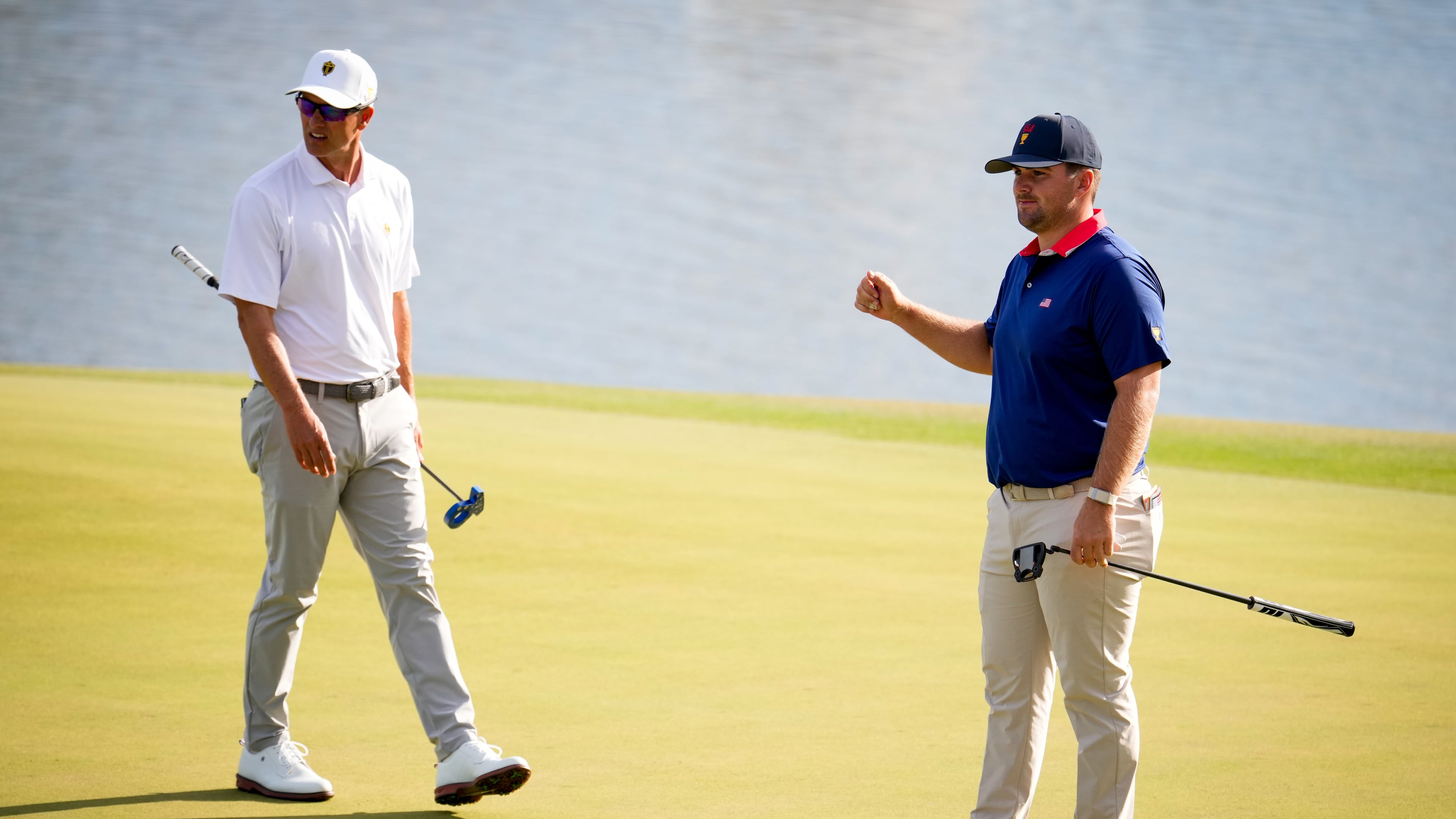 USA teams' Chris Gotterup, right, watches his ball miss the cup as International teams' Adam Scott, of Australia, looks on during a Presidents Cup golf tournament third round foursome match at Medinah Country Club, Saturday, Sept. 26, 2026, in Medinah, Ill. (AP Photo/Matt Slocum)