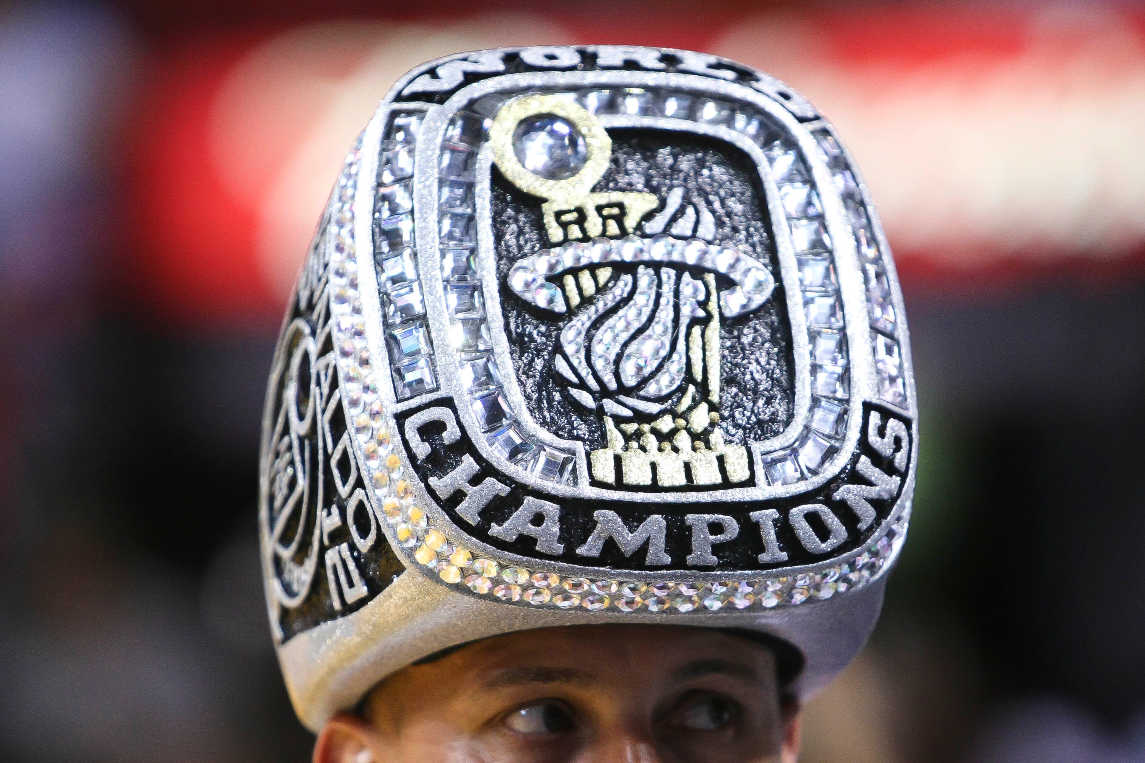 A man wearing a hat in the shape of a replica of a championship ring during pre-game action of game seven of the Eastern Conference Final between the Miami Heat and the Indiana Pacers, Monday June 03, 2013, at American Airlines Miami.(Bill Ingram/Palm Beach Post)