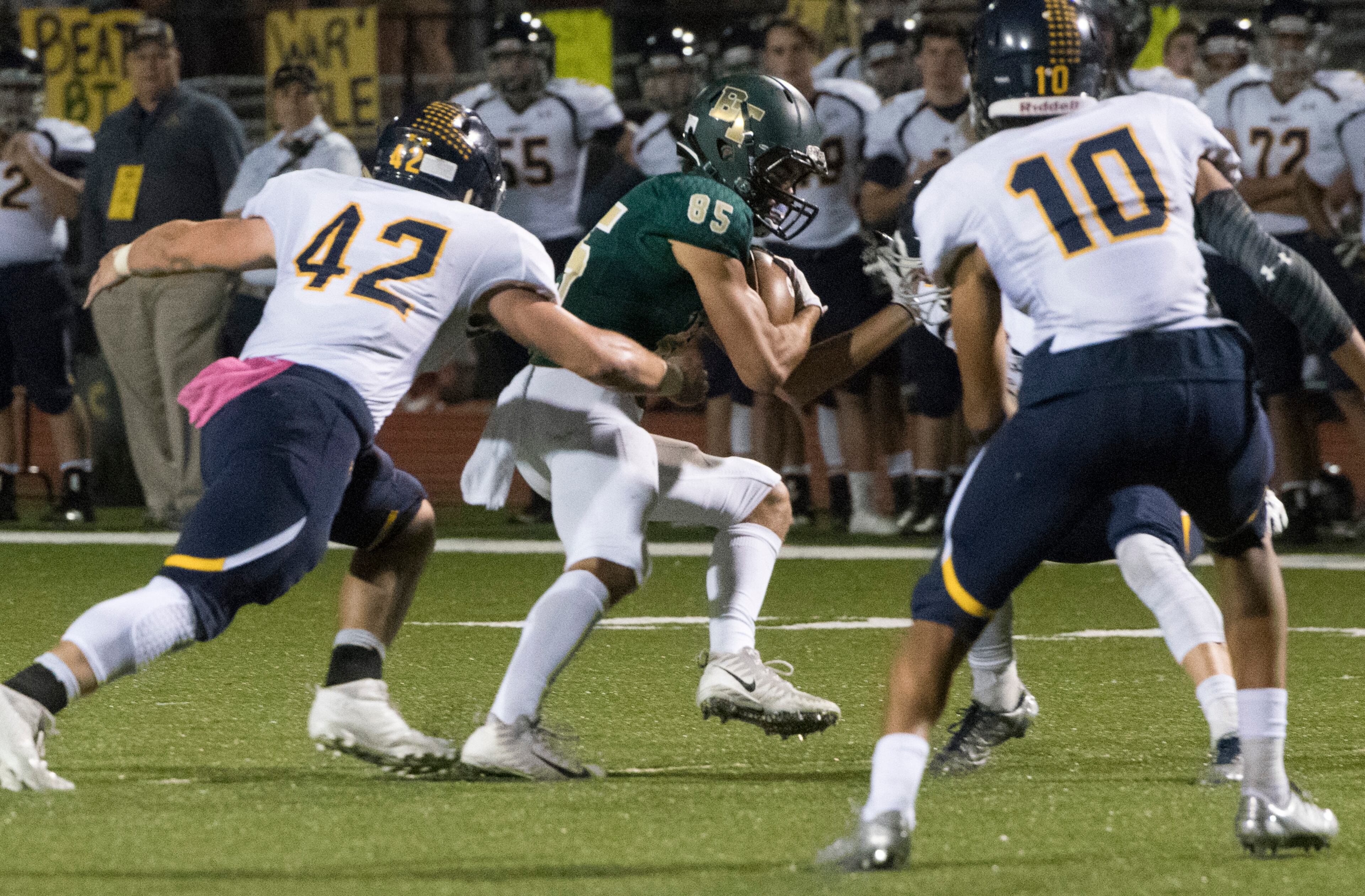 Blessed Trinity WR Will Carlton (85) runs as Marist LB Paul Stanley (42) and Kyle Hamilton (10 pursue during a high school football game, Friday, Oct. 20, 2017, in Roswell. (John Amis)