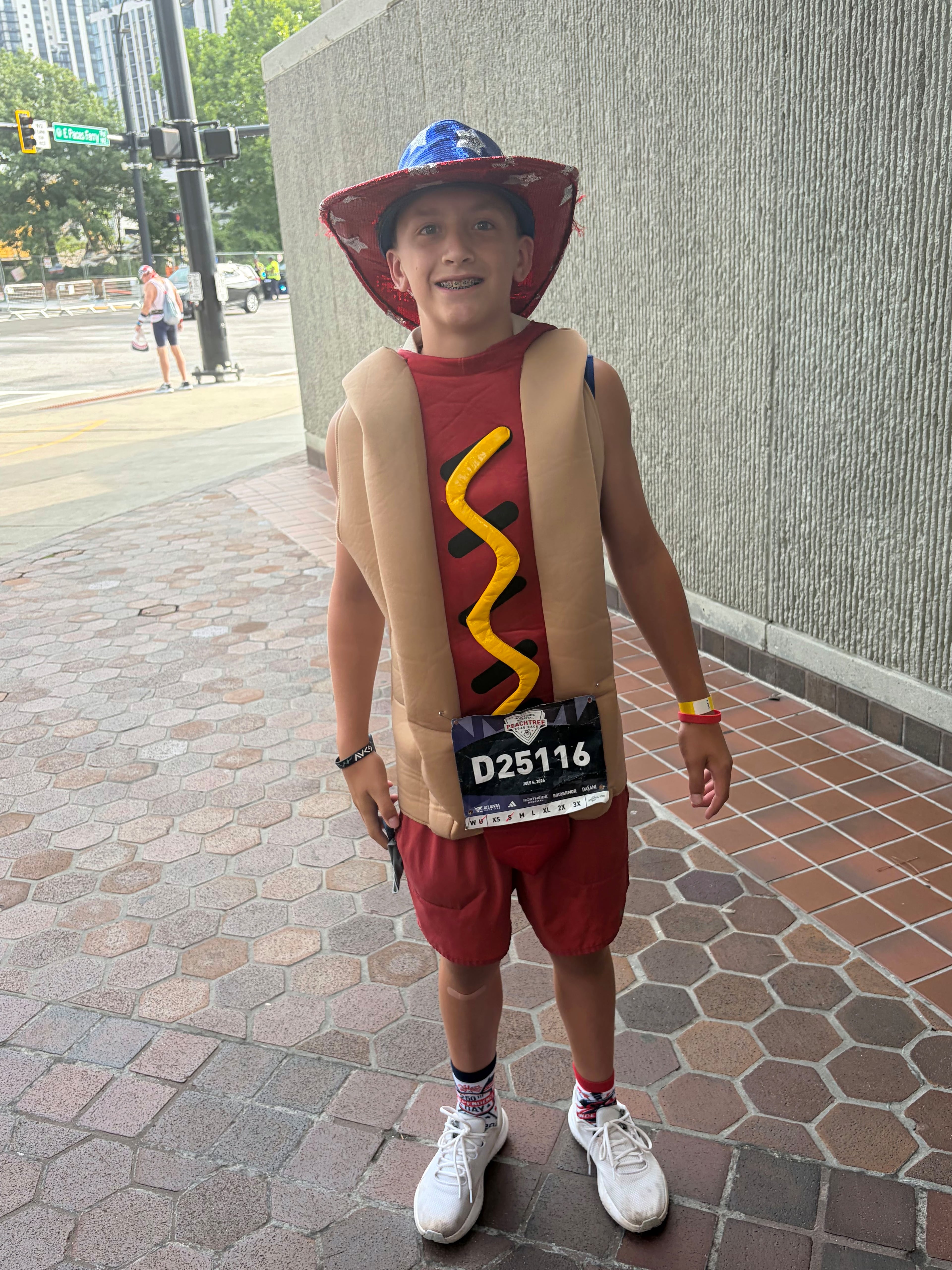 Joseph Sullivan, 13, opted to wear a hot dog costume and an America-themed cowboy hat for his fourth Peachtree Road Race. “It was 250, so I decided that I wanted to celebrate a little bit more than the other ones,” Sullivan said.