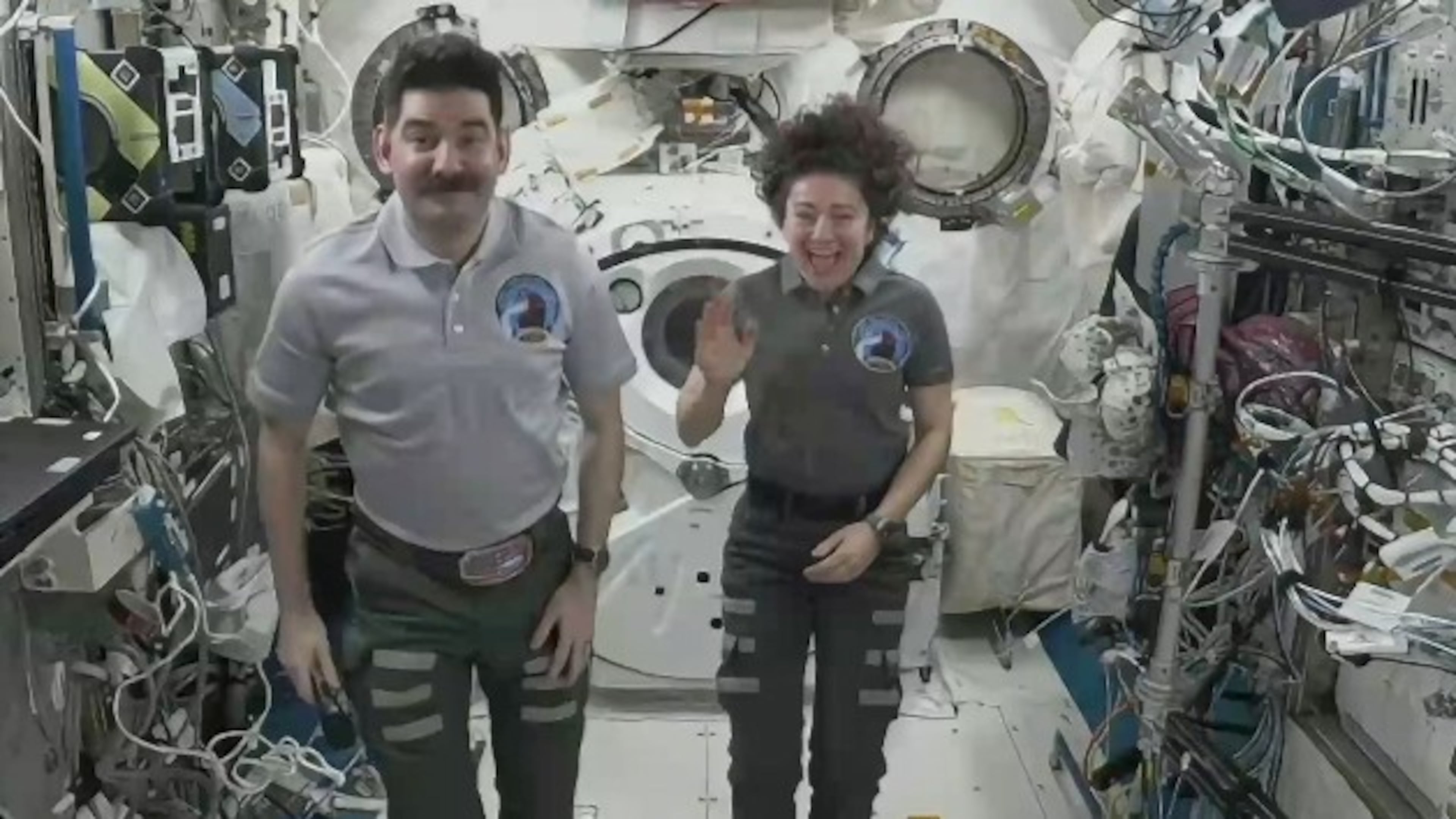 NASA astronauts Jessica Meir and Jack Hathaway participate in an interview while aboard the International Space Station on Wednesday, Aug. 19, 2026. (NASA via AP)