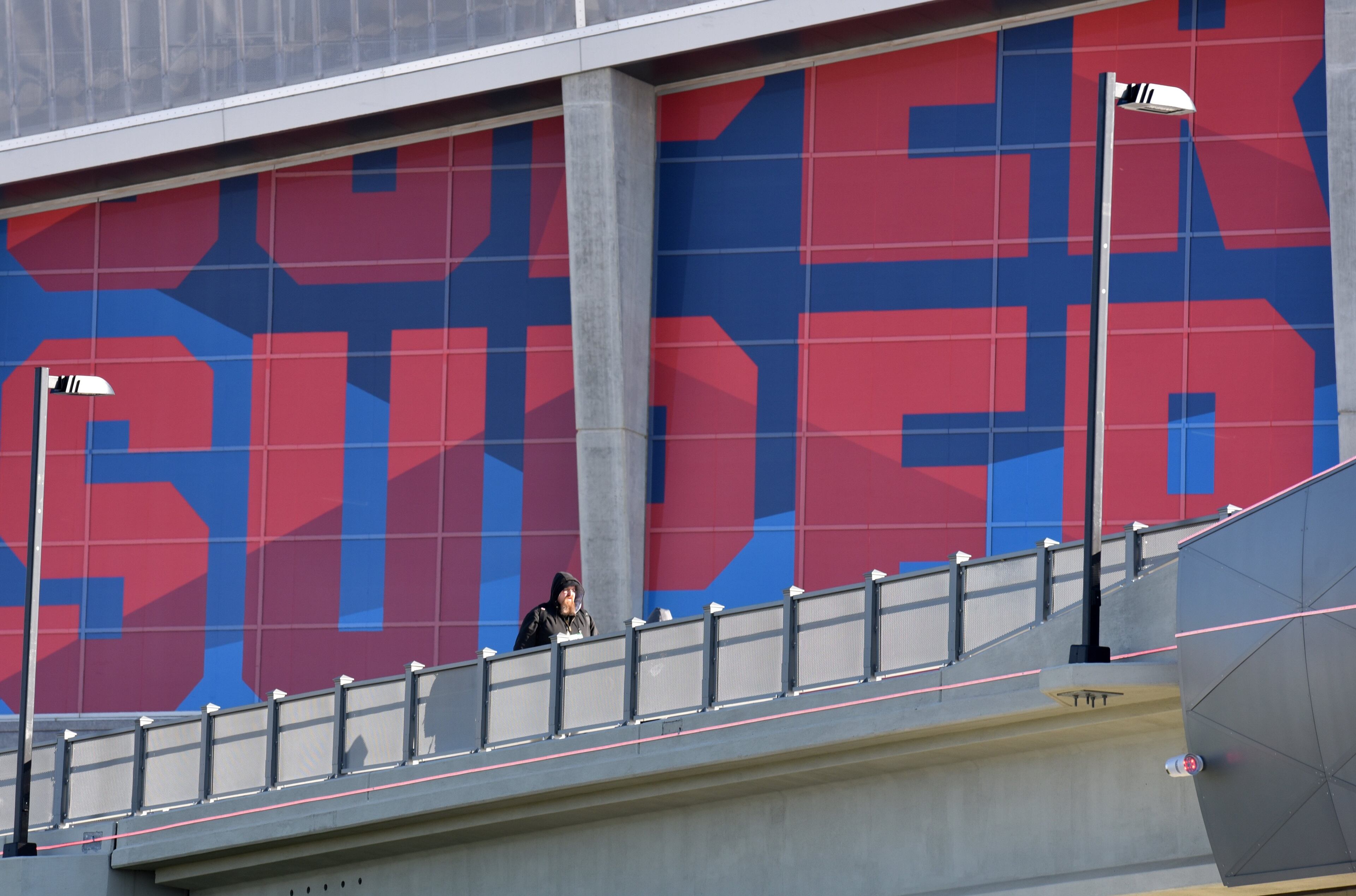 January 29, 2019 Atlanta - Picture shows Northside Drive pedestrian bridge outside Mercedes-Benz Stadium on Tuesday, January 29, 2019. In March, the Atlanta City Council grudgingly approved an additional $10 million to complete the Northside Drive pedestrian bridge in time for Super Bowl 53. They were told that the project's total cost would not exceed $23.2 million and that it was needed to connect residents in the Vine City community to downtown and the stadium. It turns out that the bridge is closed to the public for the big game and that the city actually spent more than $27 million on the project. HYOSUB SHIN / HSHIN@AJC.COM