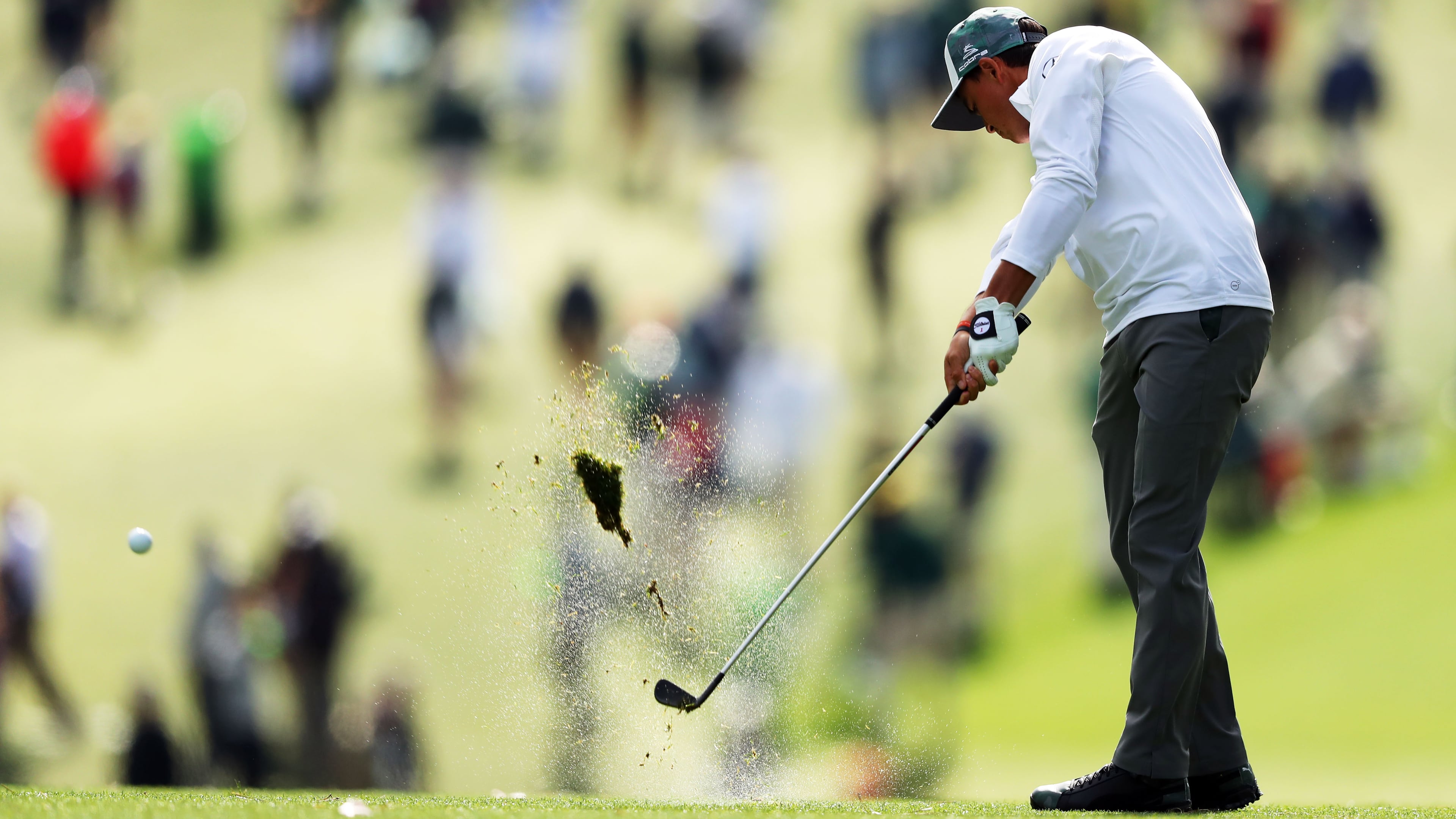 Rickie Fowler hits his shot on the first fairway as play begins in the opening round of the 81st Masters tournament at the Augusta National Golf Club, Thursday April 6, 2017. CURTIS COMPTON/ AJC