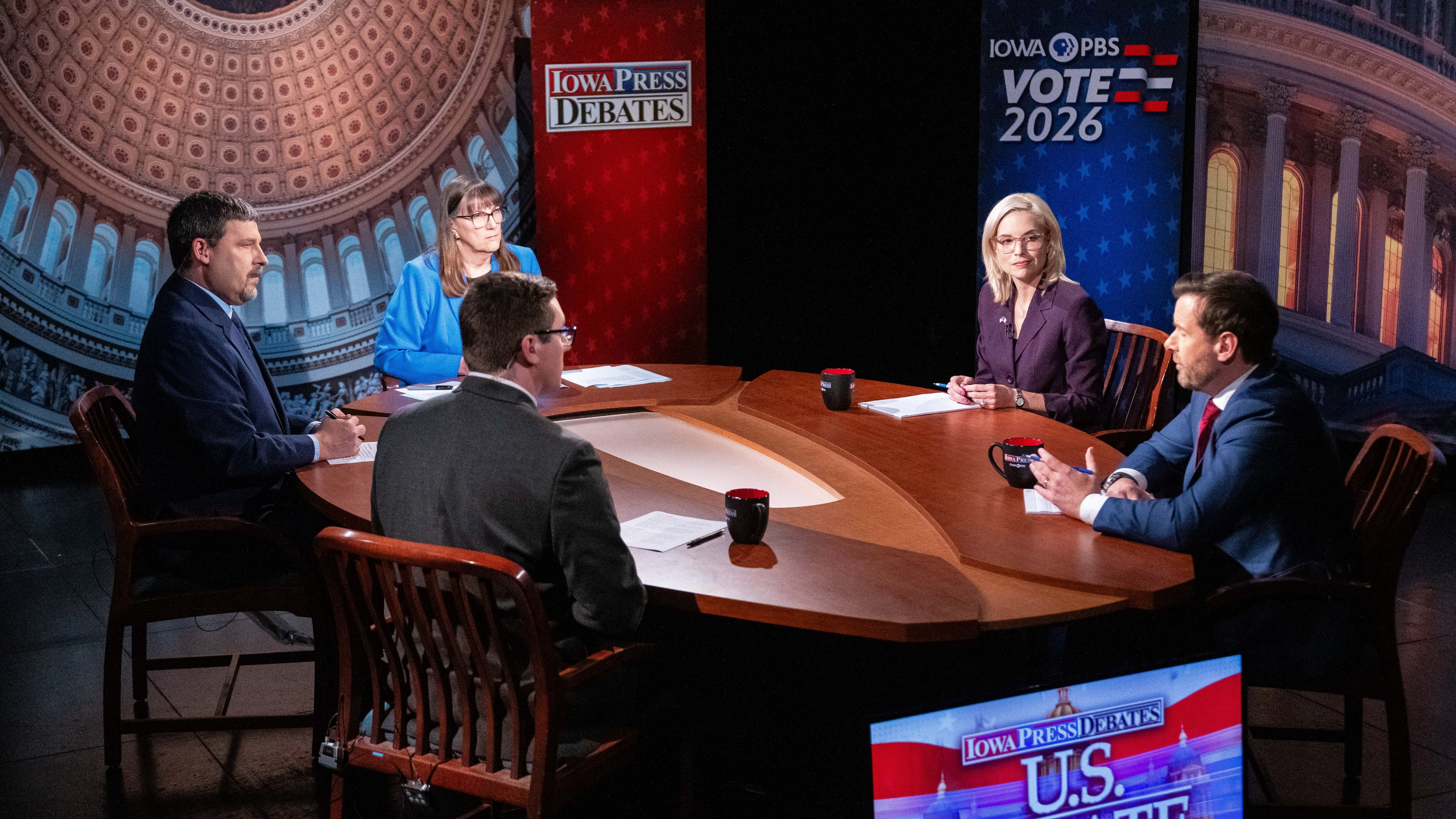 U.S. Senate candidates Rep. Ashley Hinson, R-Iowa, and Rep. Josh Turek, D-Council Bluffs, take questions during a debate Wednesday, Oct. 7, 2026, in Johnston, Iowa. (Cody Scanlan/The Des Moines Register via AP, Pool)
