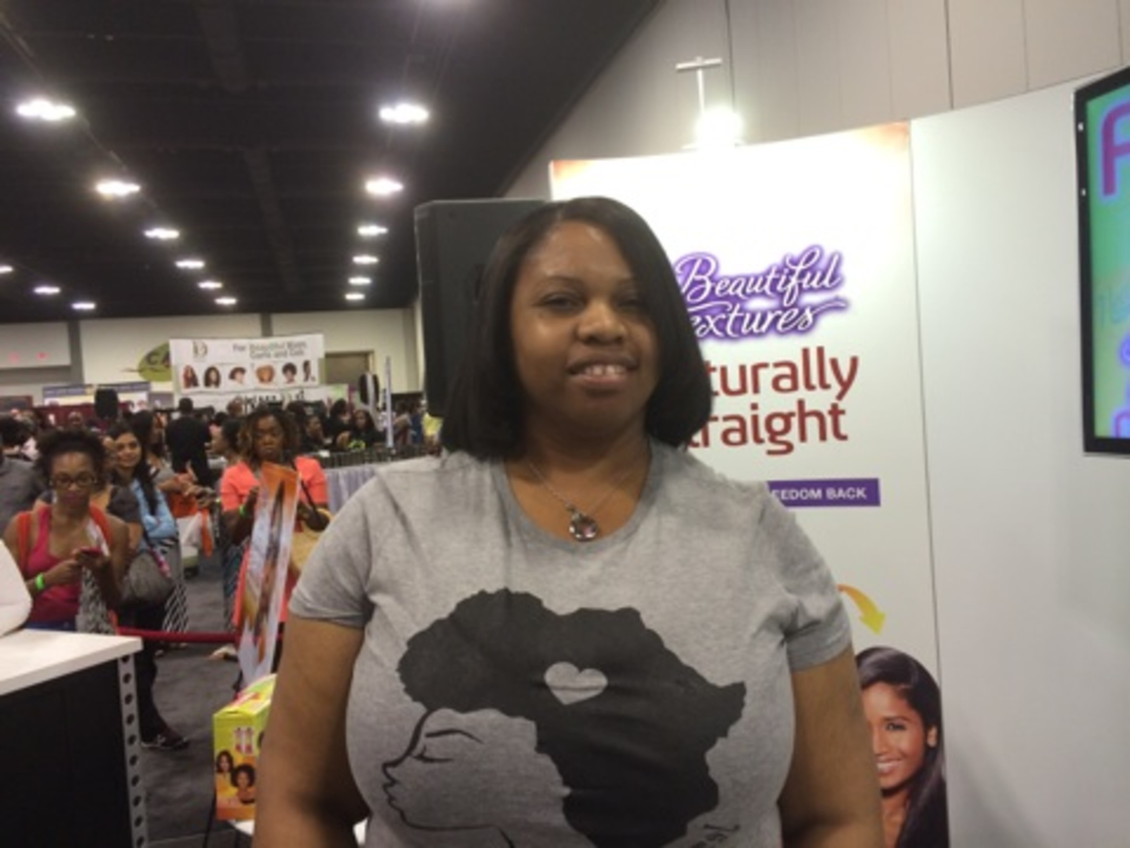 An attendee gets a hair makeover (after).