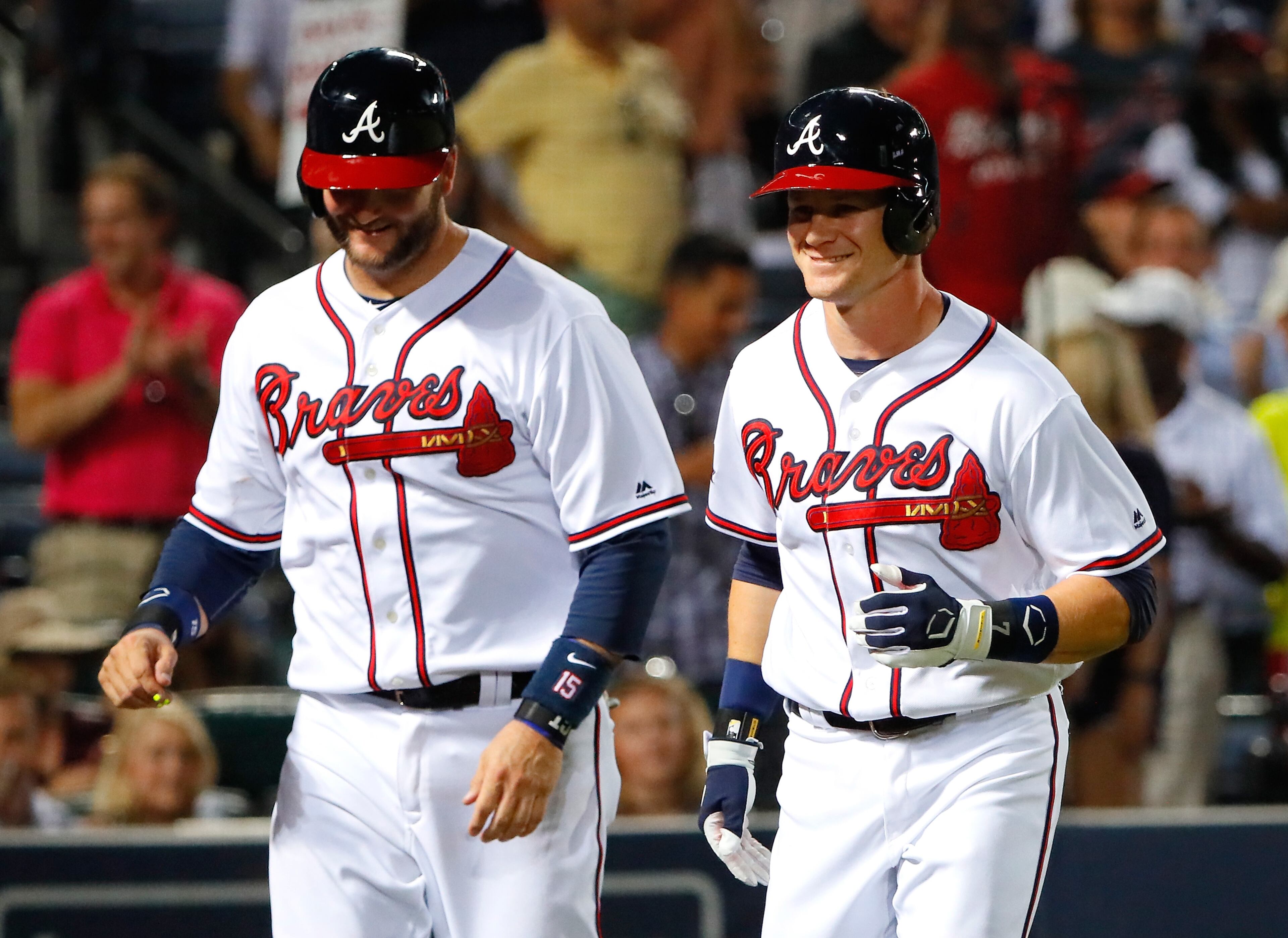 Gordon Beckham #7 of the Atlanta Braves celebrates his two-run homer in the sixth inning against the Milwaukee Brewers that scored A.J. Pierzynski #15 at Turner Field on May 25, 2016 in Atlanta, Georgia. (Photo by Kevin C. Cox/Getty Images)