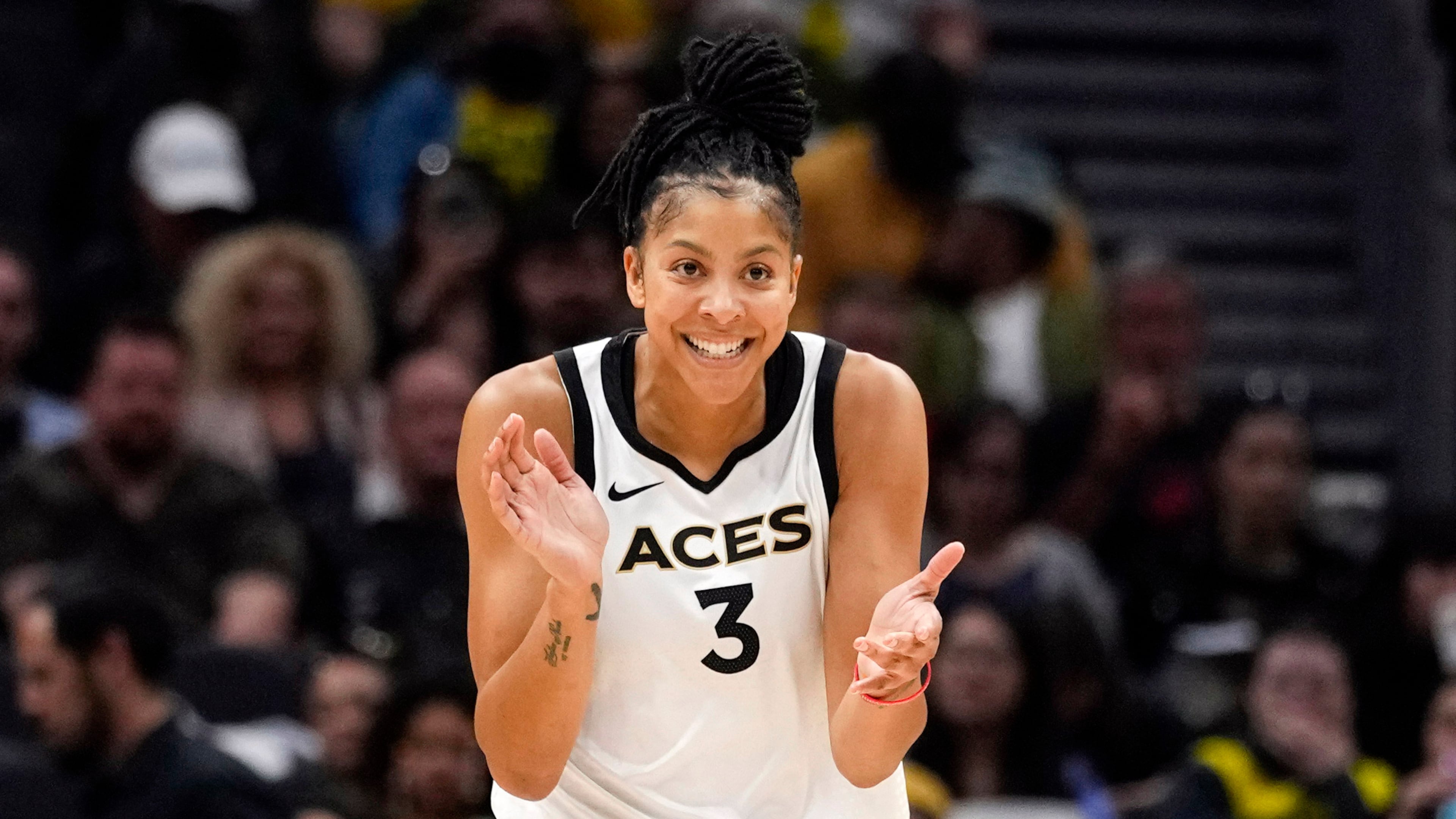 FILE - Former Las Vegas Aces forward Candace Parker reacts during the first half of a WNBA basketball game against the Seattle Storm, May 20, 2023, in Seattle. (AP Photo/Lindsey Wasson, File)