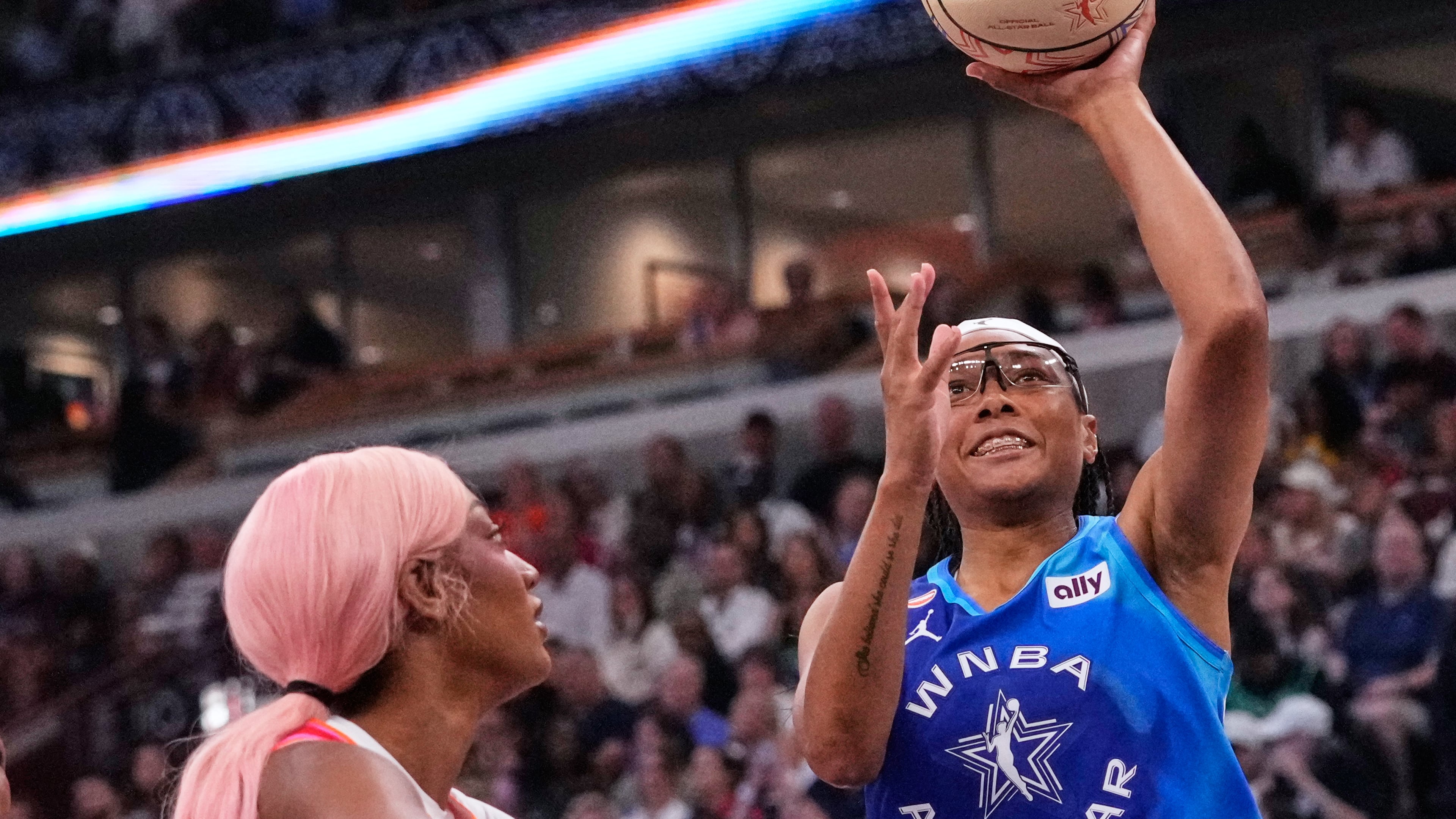 Team Spoon's Allisha Gray, right, drives to the basket against Team Coop's Angel Reese, left, during the first half of a WNBA All-Star basketball game in Chicago, Saturday, July 25, 2026. (AP Photo/Nam Y. Huh)
