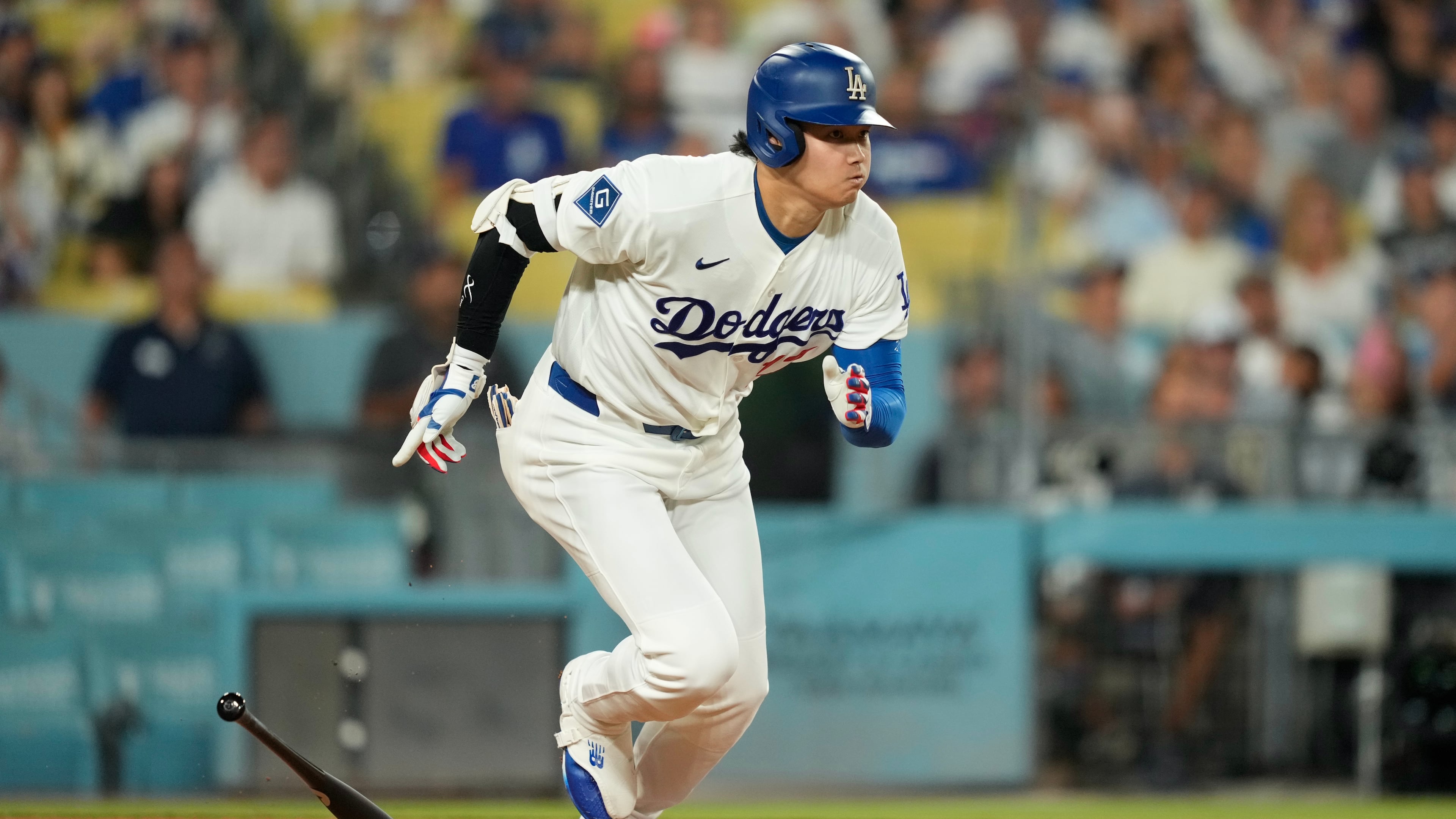 Los Angeles Dodgers' Shohei Ohtani heads to first for a single during the first inning of a baseball game against the San Diego Padres, Wednesday, Sept. 23, 2026, in Los Angeles. (AP Photo/Mark J. Terrill)