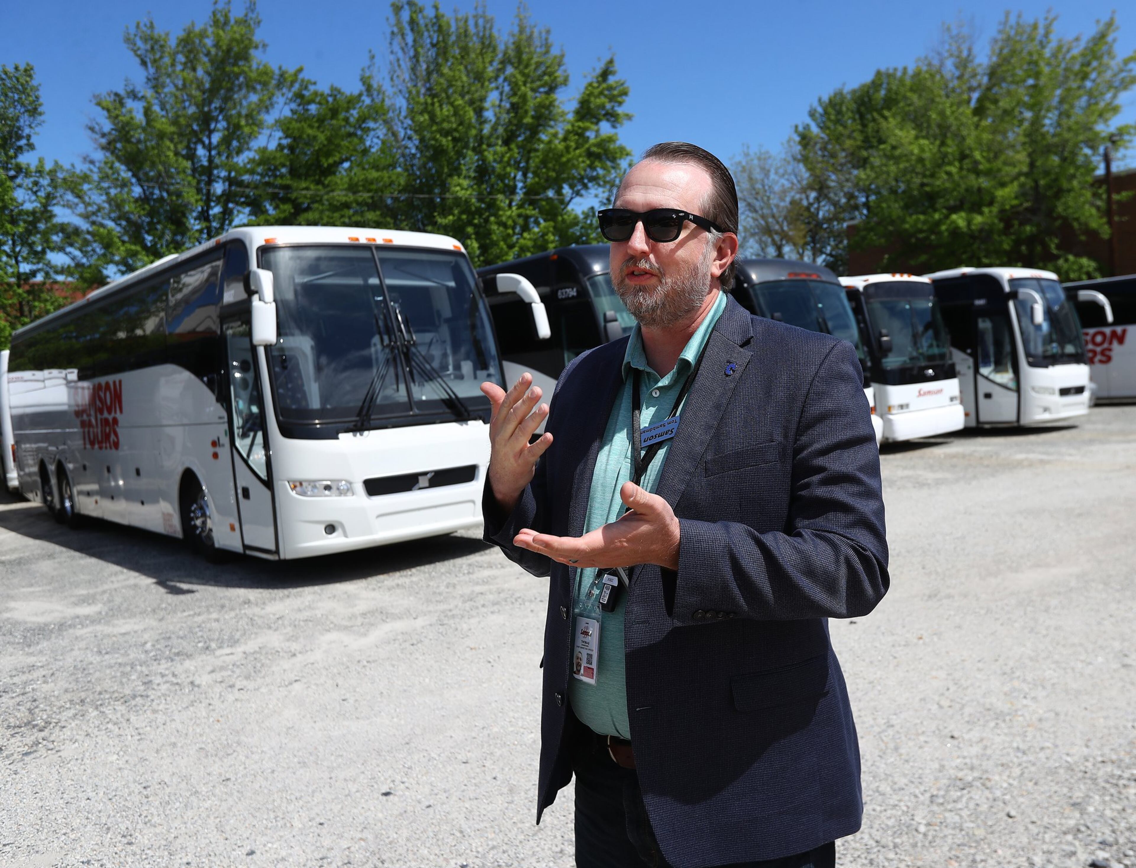 Tom Sambdman, co-owner of Samson Tours whose coaches and school buses sit idle, is waiting for federal relief loans and trying to decide how to use them on Wednesday, April 15, 2020, in Atlanta. The company wants to pay their staff of 72 employees but has no work for them until the summer. Curtis Compton ccompton@ajc.com
