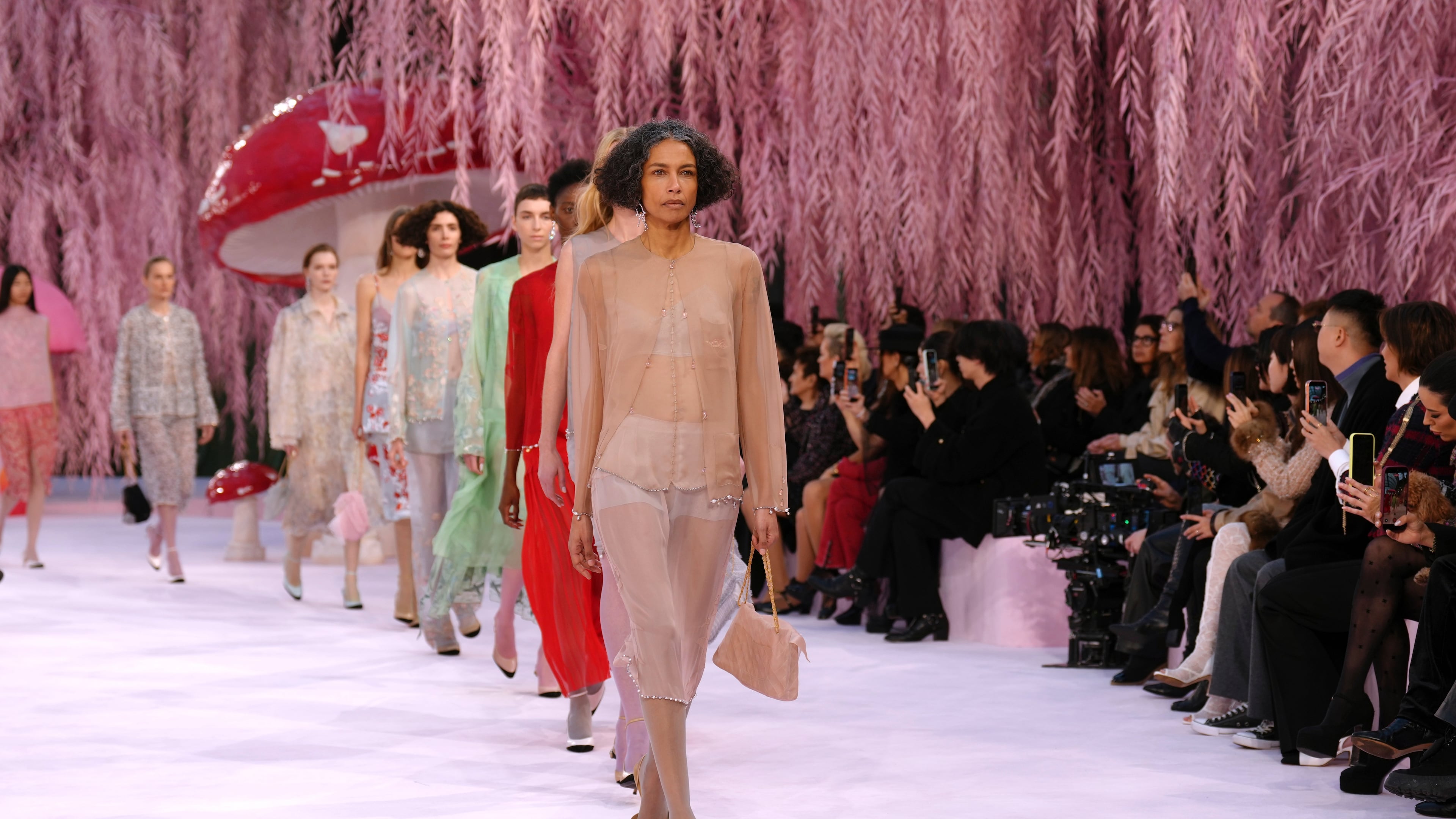 Models wear creations as part of the Chanel Spring/Summer 2026 Haute Couture collection presented in Paris, Tuesday, Jan. 27, 2026. (AP Photo/Aurelien Morissard)