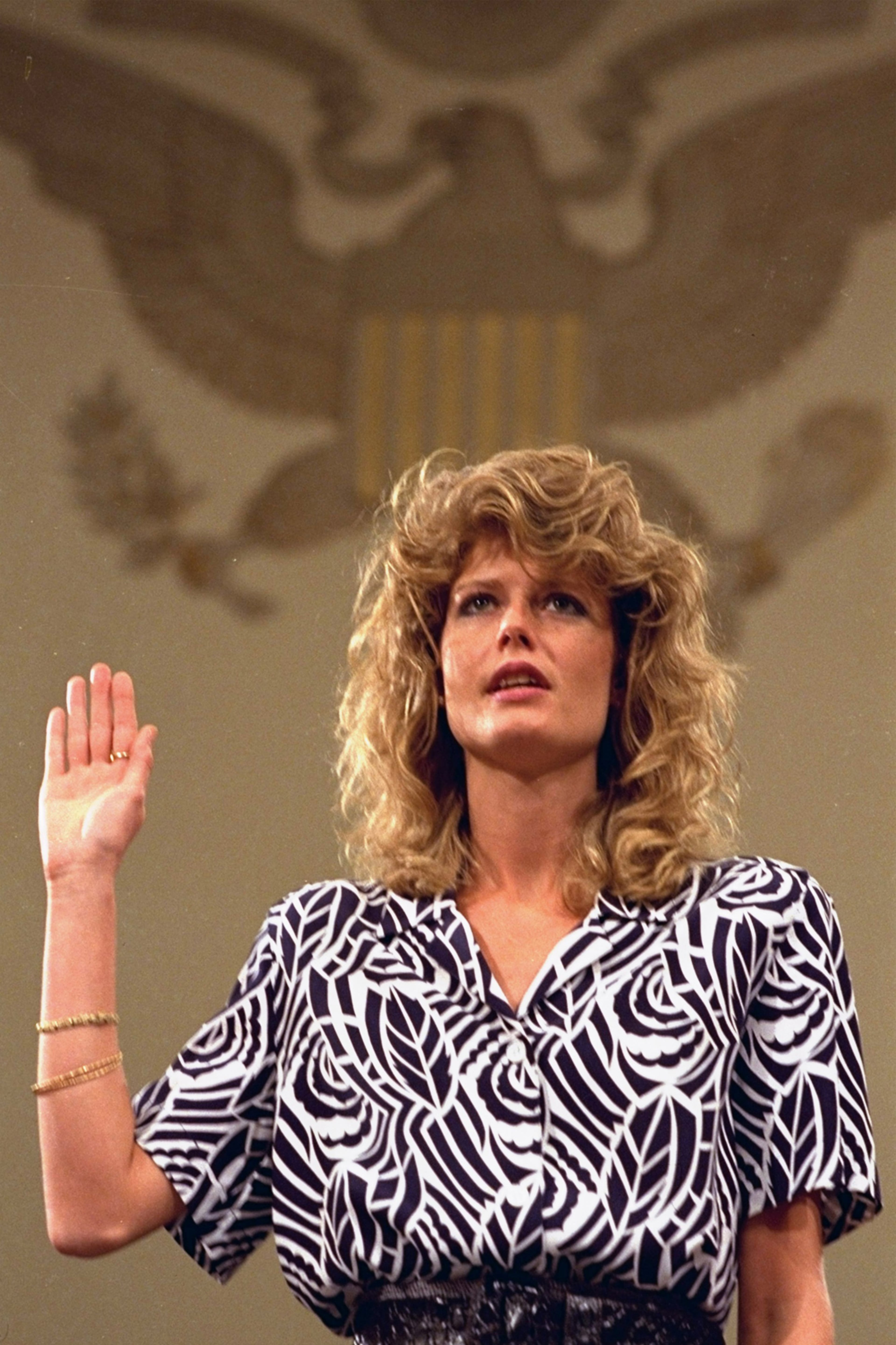 Fawn Hall is sworn in before the Iran-Contra committee on Capitol Hill in this June 8, 1987 file photo. The secretary to former National Security aide Lt. Col. Oliver North testified that both of them shredded confidential documents. According to an April article in the Washington Post, Hall is currently living "the quiet life" in West Hollywood, working at a book store.