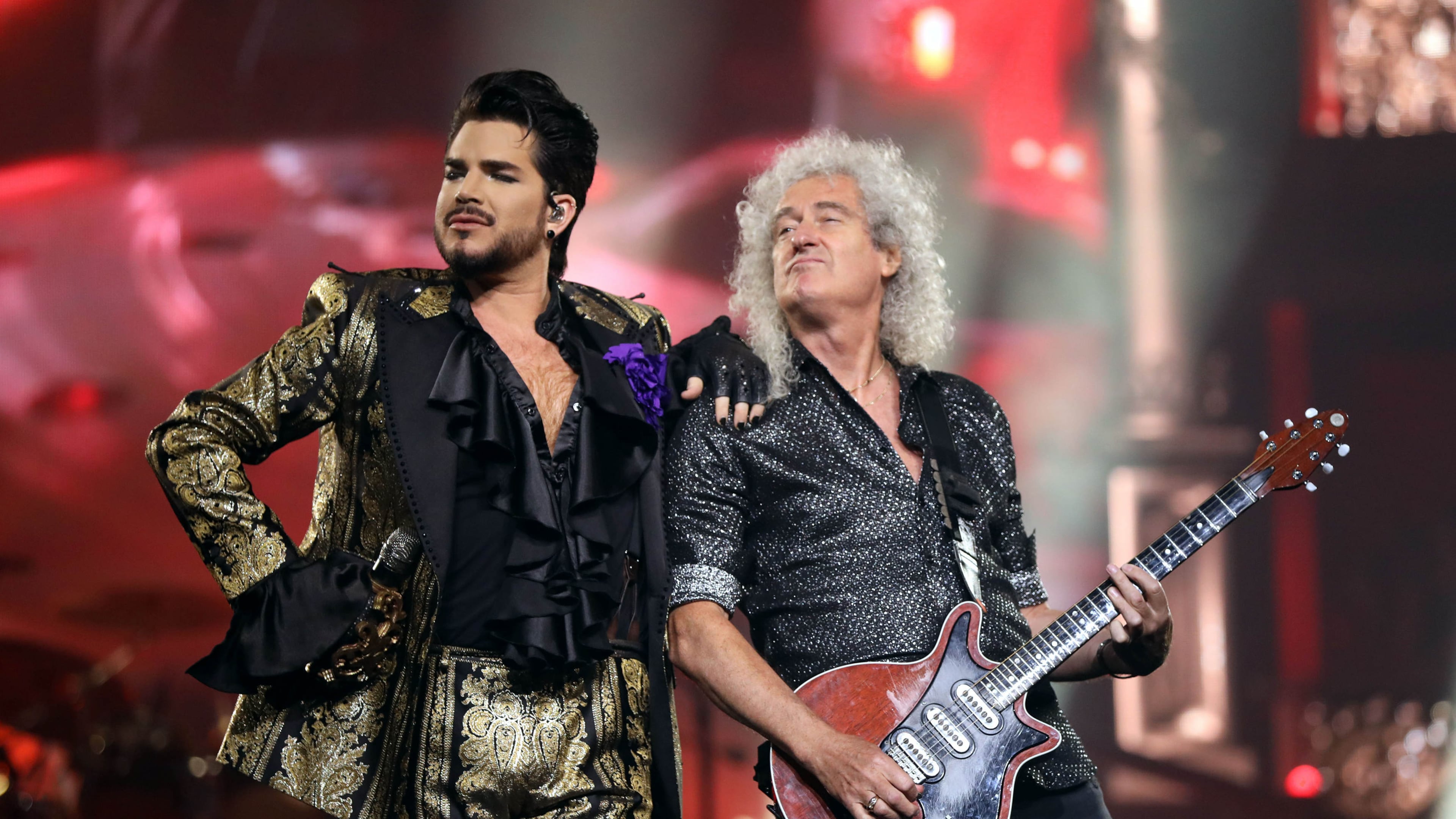 Queen + Adam Lambert (left, with Brian May) packed State Farm Arena during their "Rhapsody" tour appearance on Aug. 22, 2019.