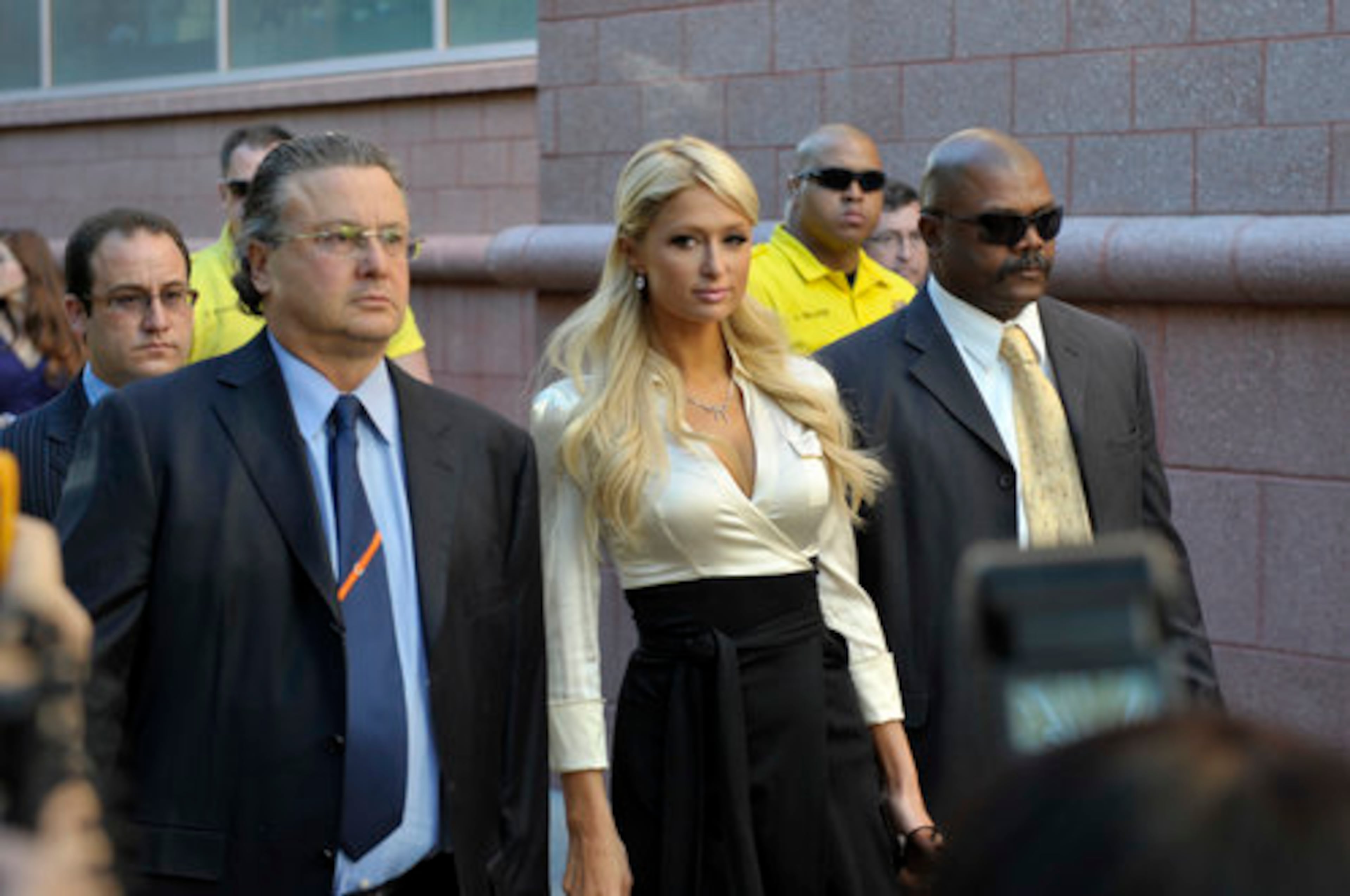 Paris Hilton arrives with her attorney David Z. Chesnoff, left, at the Clark County Regional Justice Center in Las Vegas on Monday, Sept. 20, 2010. Hilton pleaded guilty to two misdemeanor charges stemming from her arrest last month at a Las Vegas hotel-casino. She will serve a year of probation and avoid a felony charge under the terms of a plea deal worked out with prosecutors.
