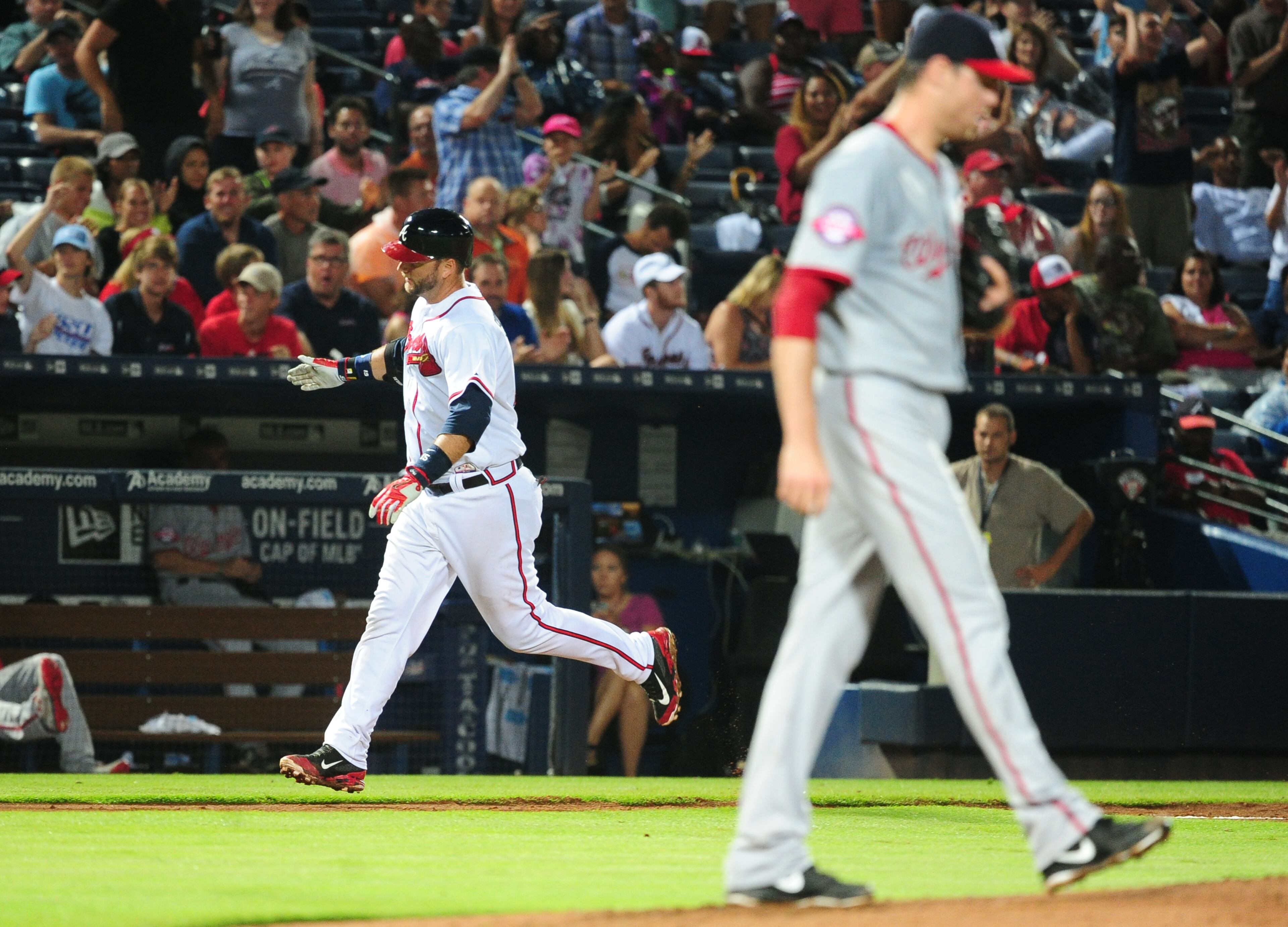 A. J. Pierzynski #15 of the Atlanta Braves rounds the bases after hitting a fourth inning two-run home run against Doug Fister #58 of the Washington Nationals at Turner Field on July 1, 2015 in Atlanta, Georgia. (Photo by Scott Cunningham/Getty Images)