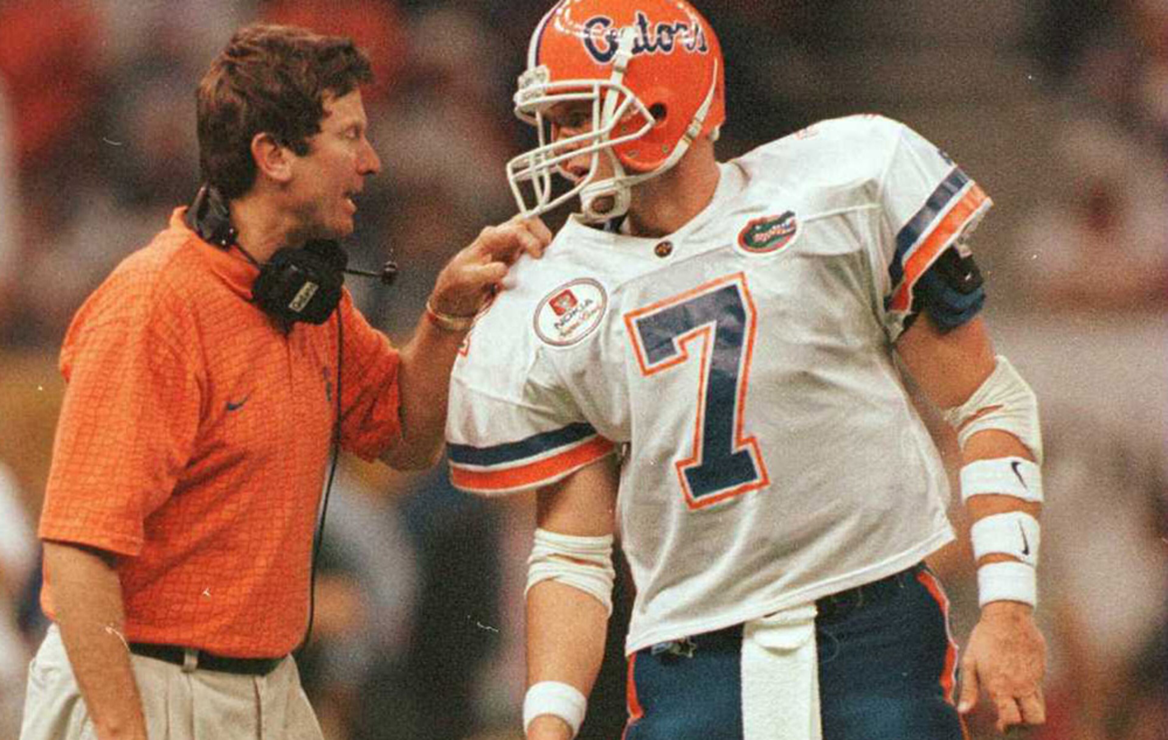 Steve Spurrier (left, with quarterback Danny Wuerffel) compiled a 122-27-1 record from 1990-2001 at Florida. (AJC file photo)