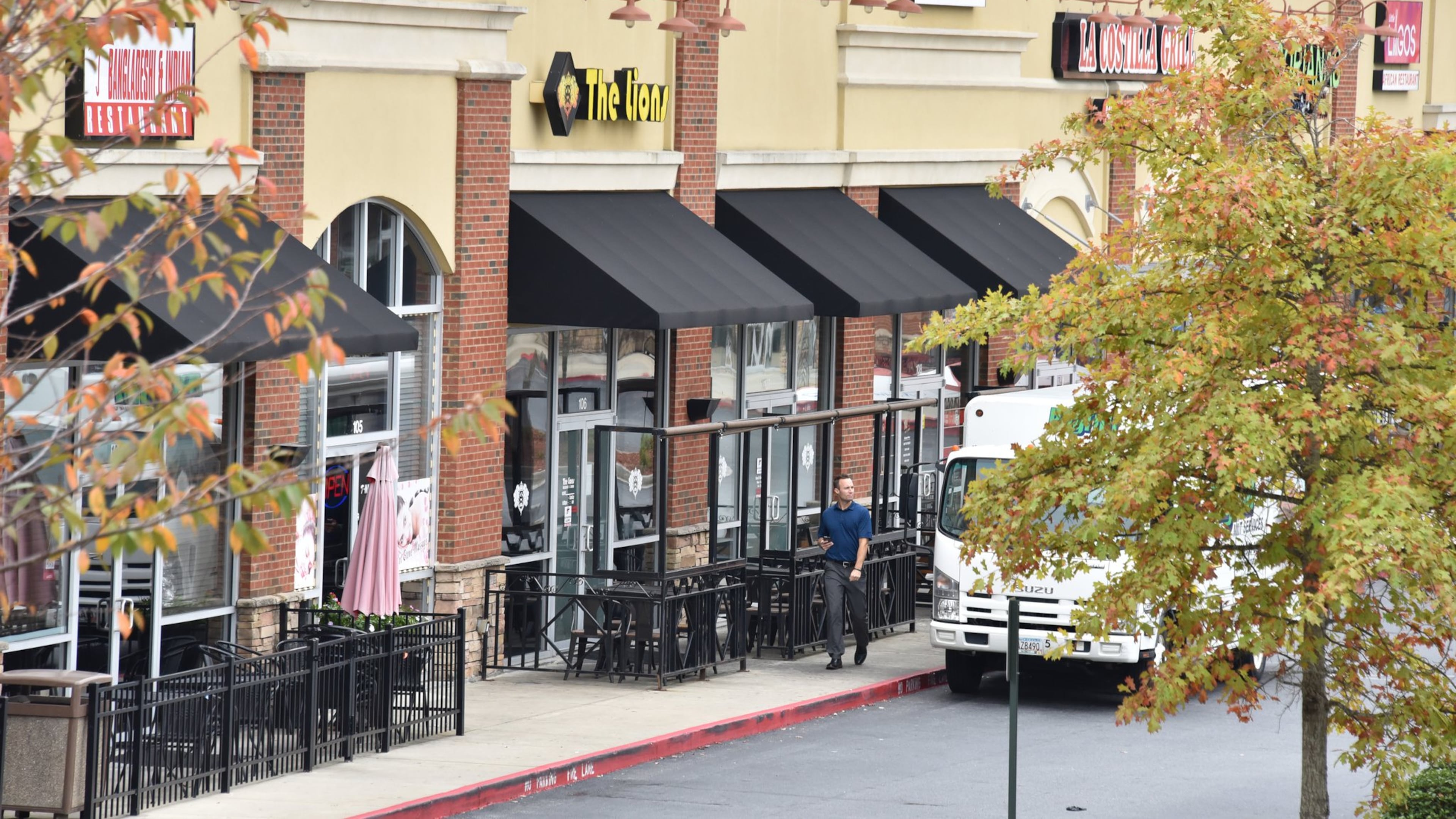 The Lions Restaurant and Hookha Lounge in the Crossroads Village shopping center is surrounded by other international businesses. (Hyosub Shin / Hyosub.Shin@ajc.com)