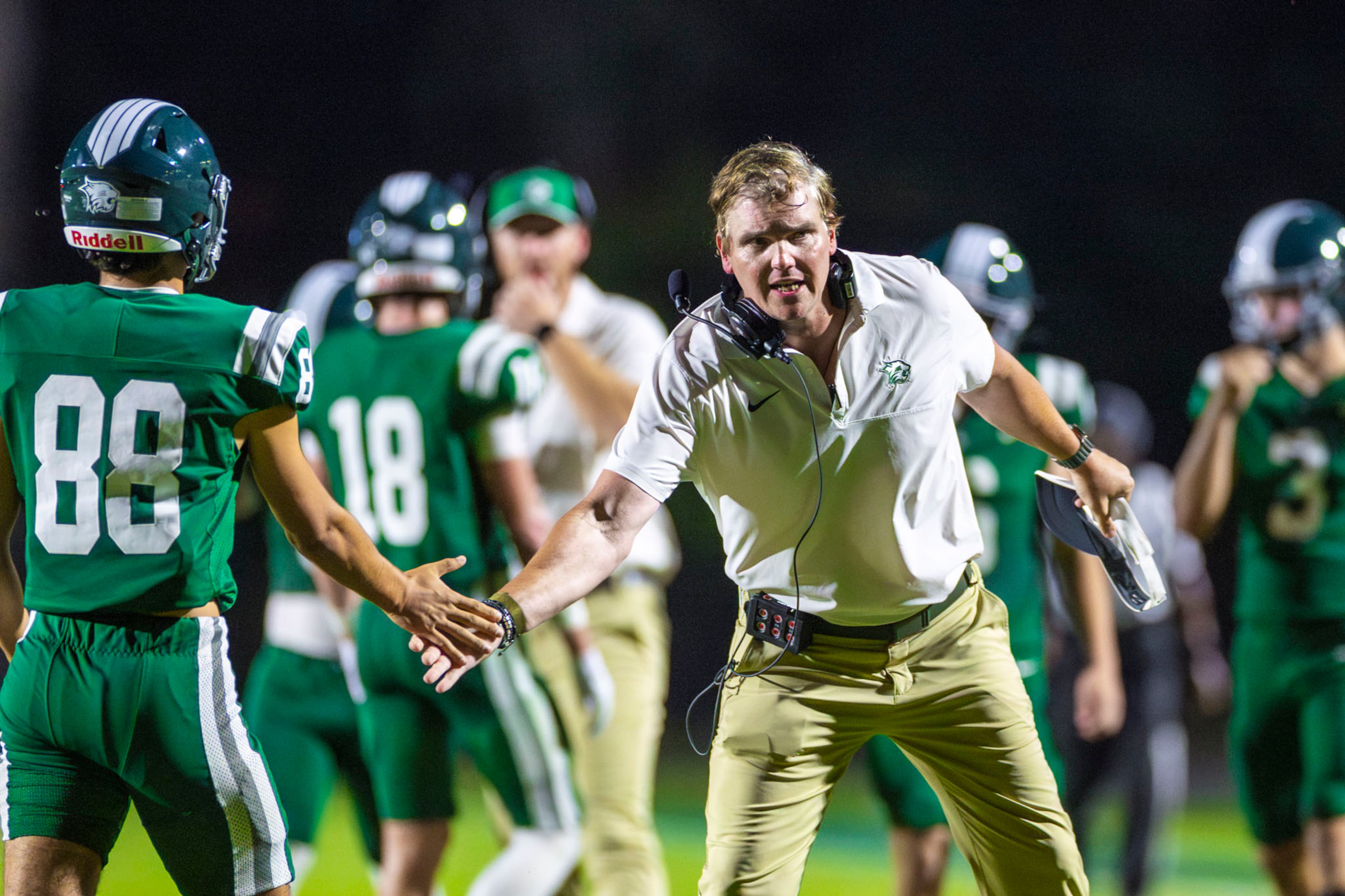 Westminster head coach Nelson Stewart congratulates defensive end Matthew Tolleson (88) against Benedictine at Fritz Orr Field in Atlanta, GA on Friday, Sept. 19th, 2025. (Oscar Guevara Saenz for the AJC)