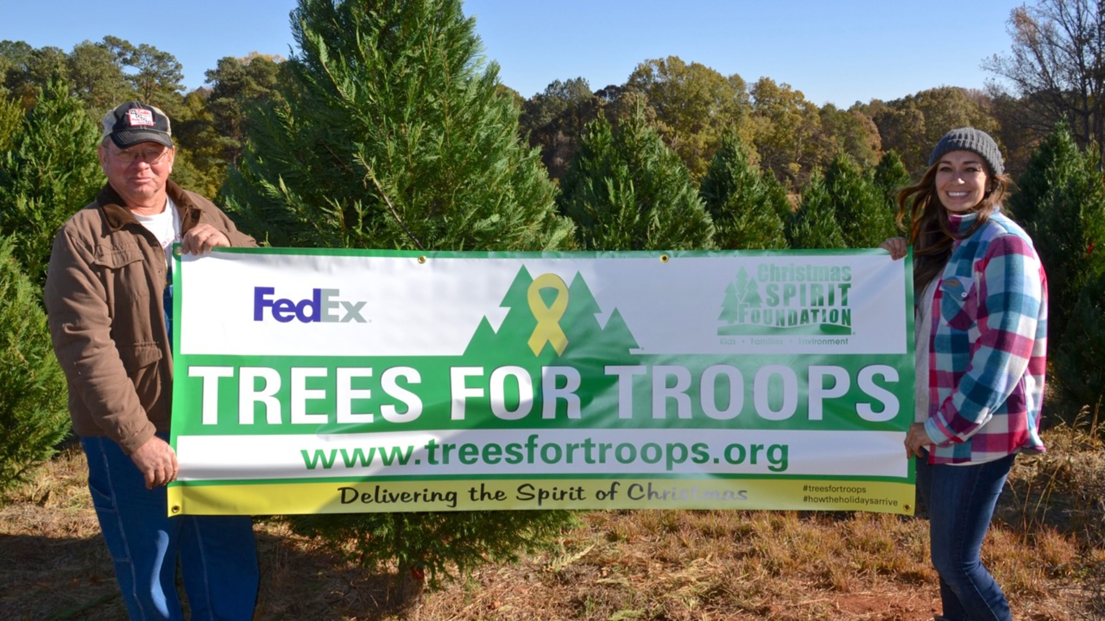 Rick Minter and Stephanie Minter Adameck coordinate the Trees for Troops program at Minter’s Farm in Fayette County. Photo by Jill Howard Church for the AJC