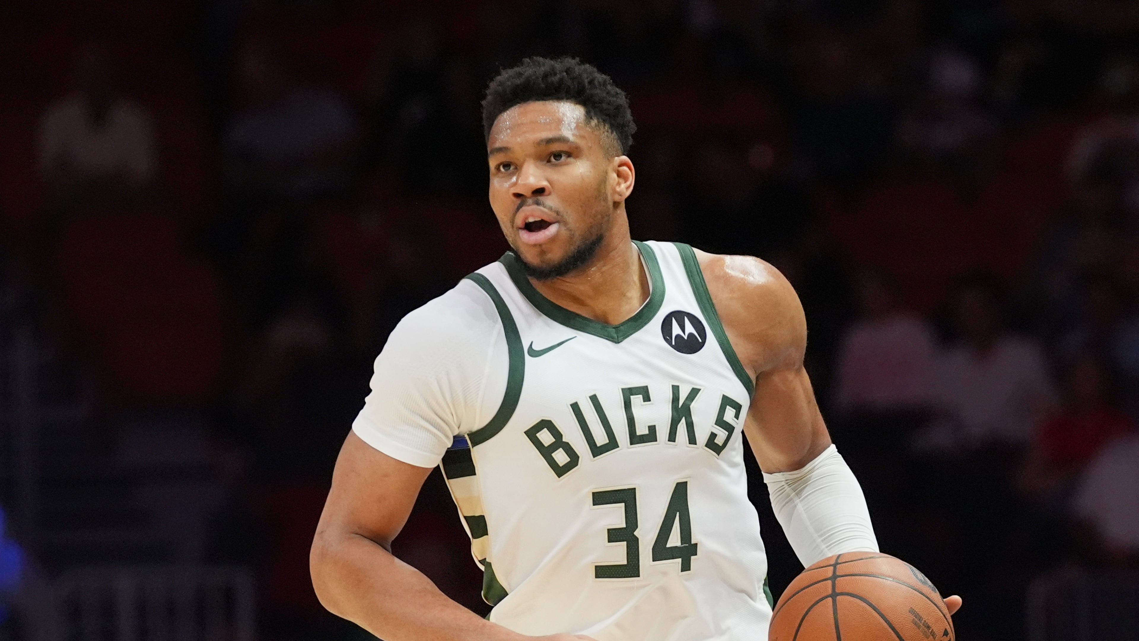 FILE - Milwaukee Bucks forward Giannis Antetokounmpo (34) dribbles the ball during the first half of an NBA basketball game against the Miami Heat, March 12, 2026, in Miami. (AP Photo/Marta Lavandier, File)
