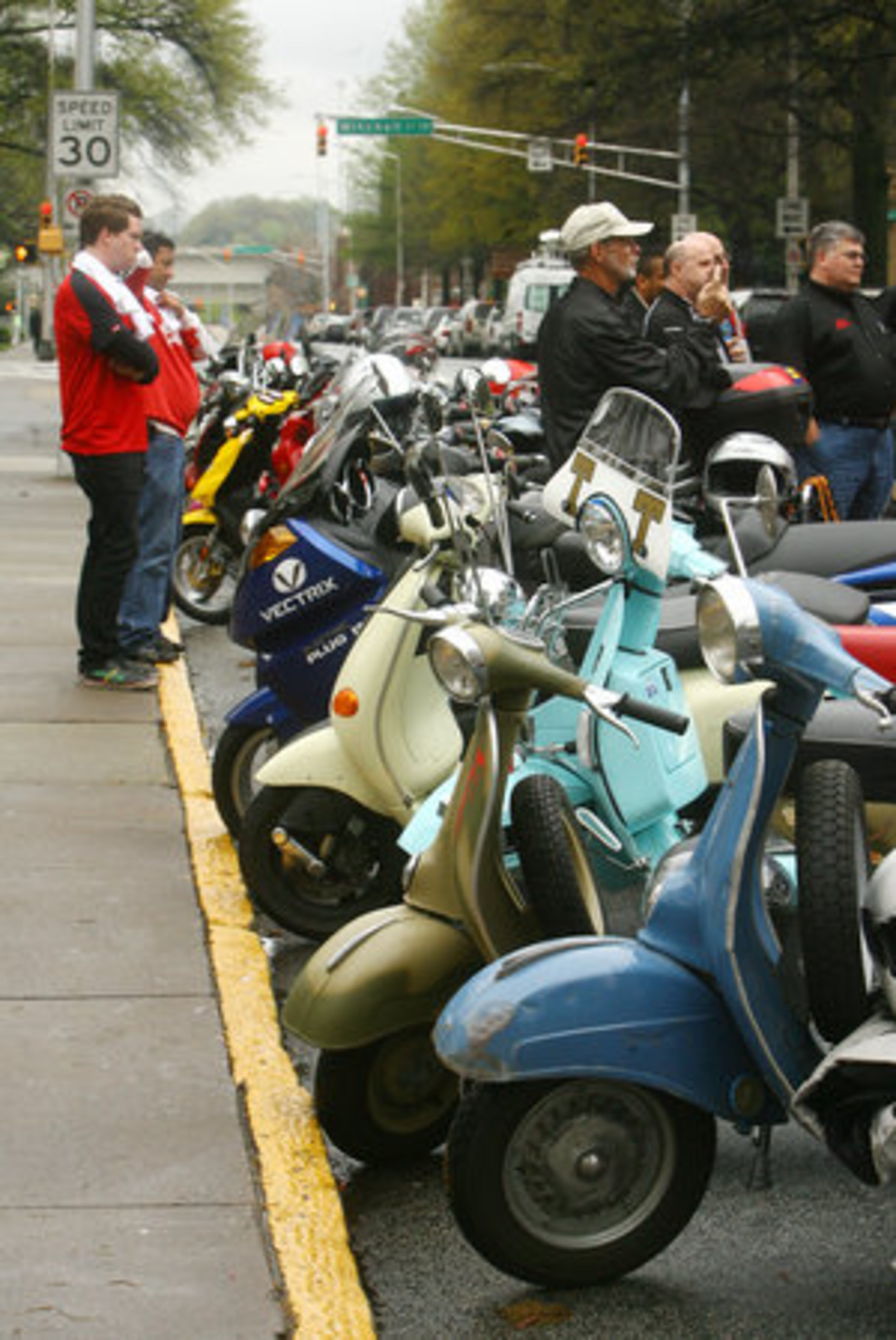 Washington Street in front of the Capitol became a temporary parking area for scooters as scooter enthusiasts from around metro Atlanta ride to the Capitol to celebrate the second annual Atlanta Scooter Commuter Day.