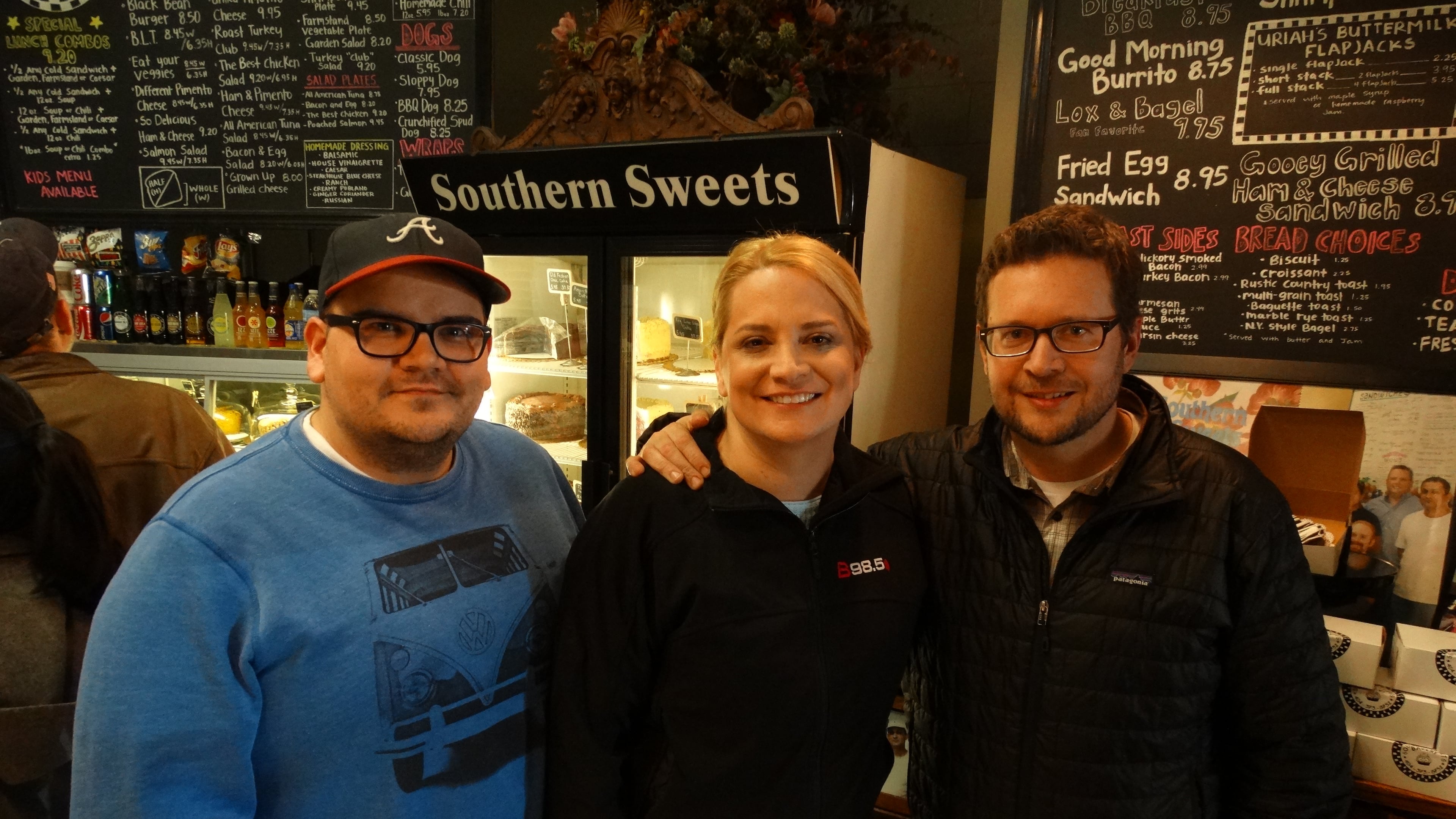 The new B98.5 morning show featuring producer Jeremy Powell (known long ago as "Fat Kid"), Melissa Carter and newcomer Tad Lemire. CREDIT: Rodney Ho/rho@ajc.com