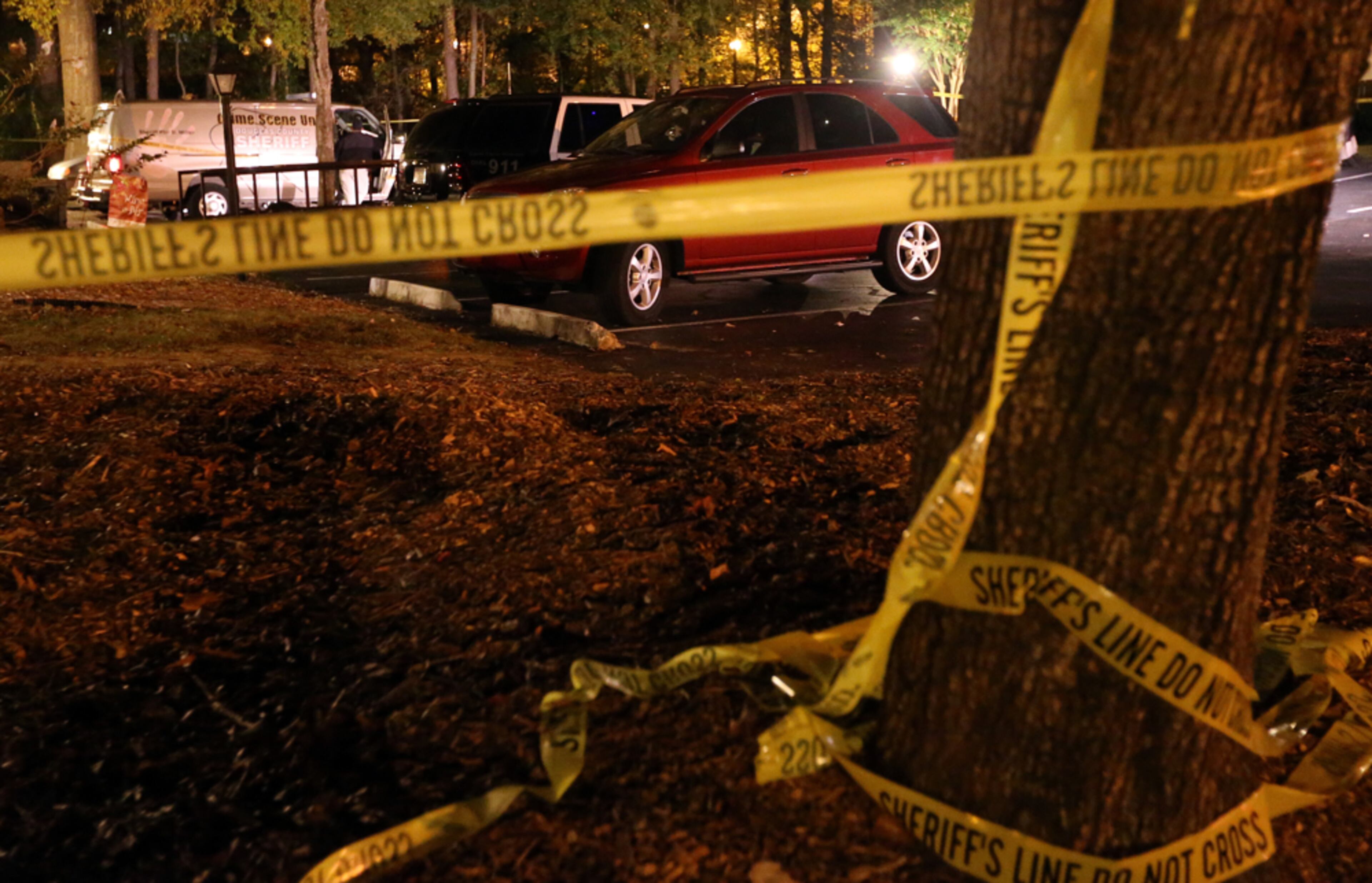 GRANDMOTHER MURDERED--November 10, 2014 Douglasville: Police wait for a search warrant Monday night November 10, 2014 after a family member found Florene Duke dead and hog-tied in her Douglasville apartment. BEN GRAY / BGRAY@AJC.COM