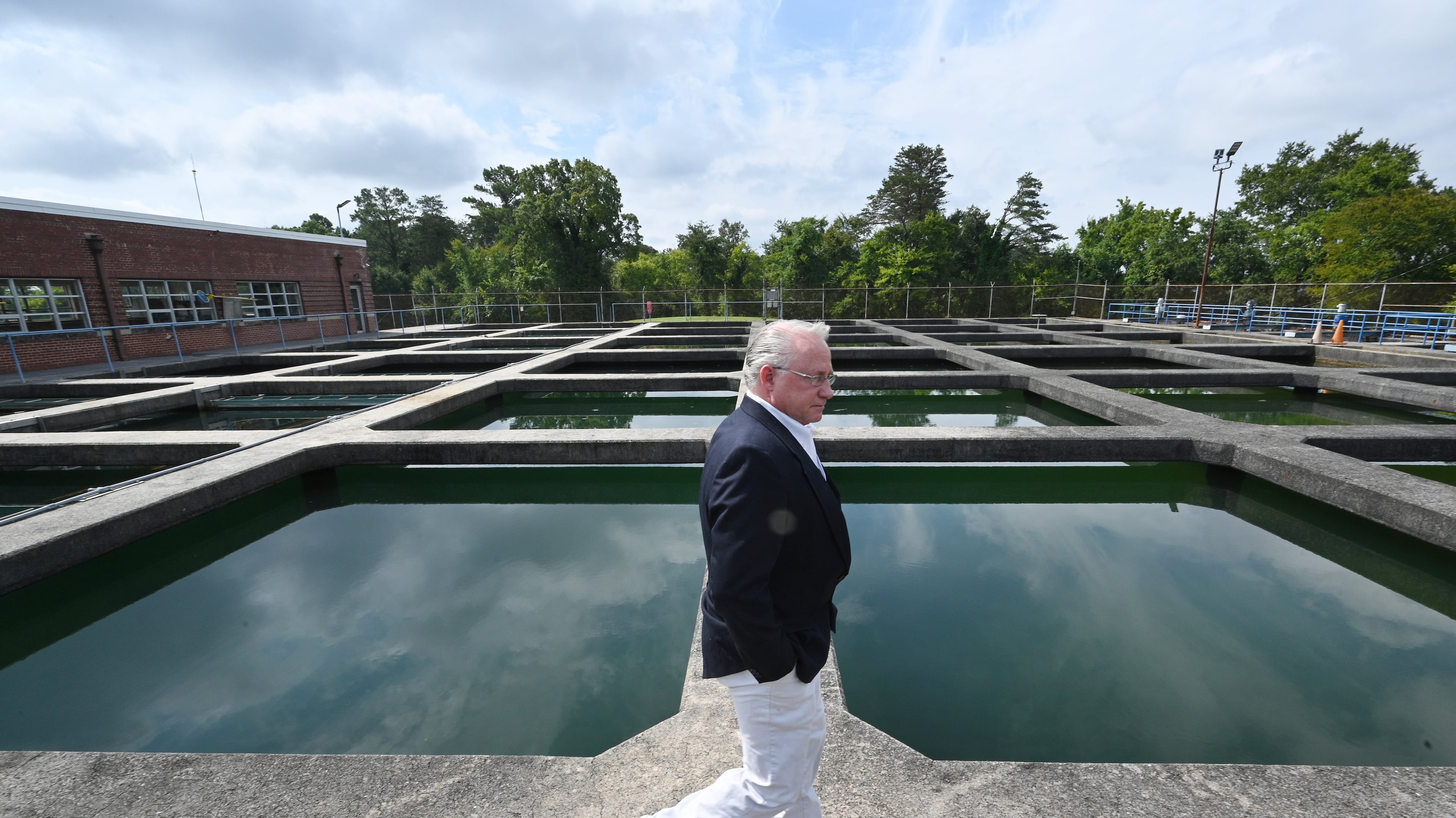 Mike Hackett, the director of the city of Rome’s water and sewer division, walks at the Bruce Hamler Water Treatment Facility in Rome on Tuesday, August 23, 2022. Rome is one of several Georgia towns and cities grappling with PFAS contamination in their water supply. (Hyosub Shin / Hyosub.Shin@ajc.com)