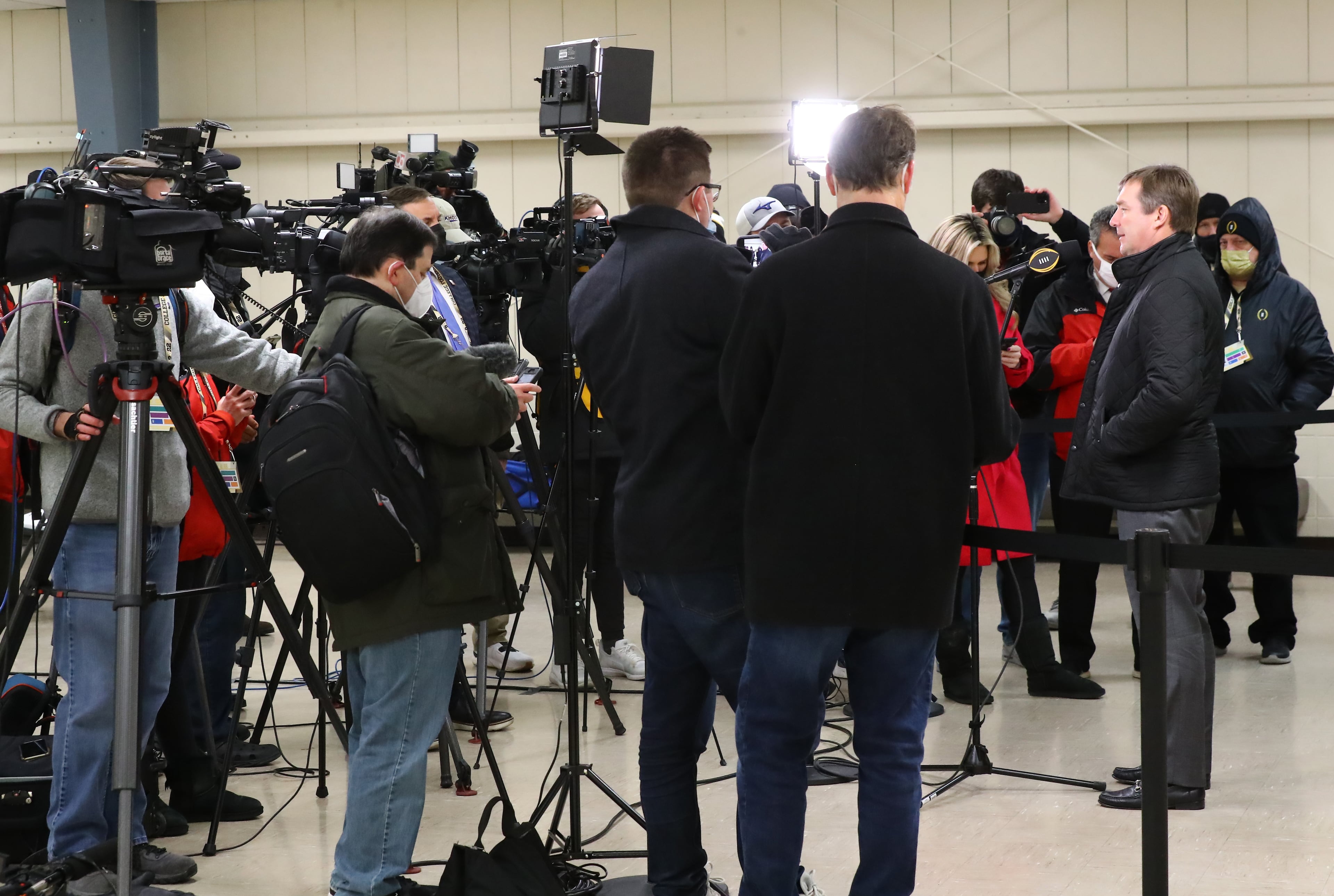 010722 Indianapolis: Georgia head coach Kirby Smart (right) takes questions from the media during the College Football Playoff National Championship team arrivals at Indianapolis Airport on Friday, Jan. 7, 2022, in Indianapolis. “Curtis Compton / Curtis.Compton@ajc.com”`