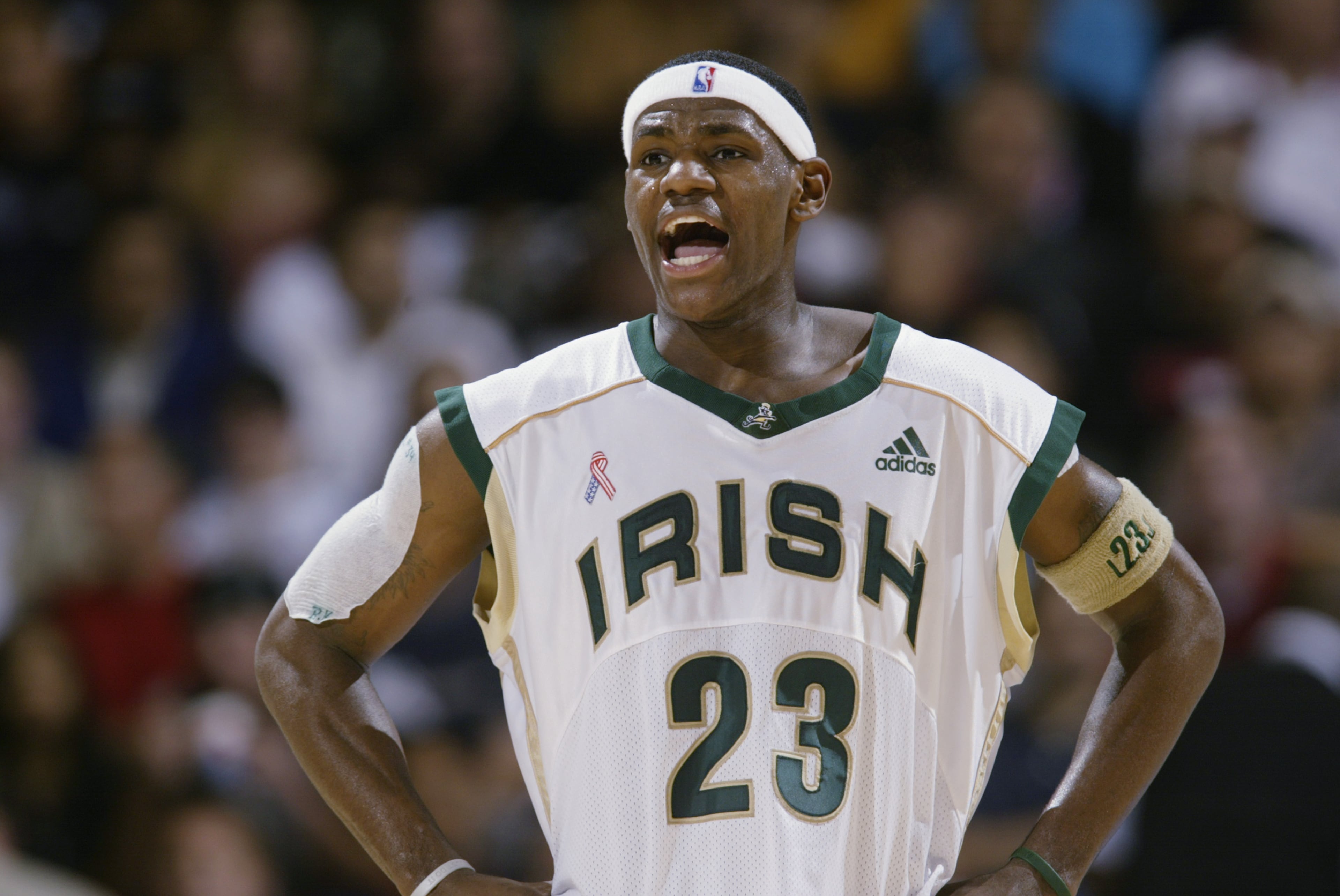 LeBron James #23 of St. Vincent-St. Mary High School talks on the court during the Ninth Pangos Dream Classic game against Mater Dei High School at Pauley Pavilion on the UCLA campus on January 4, 2003 in Los Angeles, California. St. Vincent-St. Mary won 64-58. (Photo by Stephen Dunn/Getty Images)