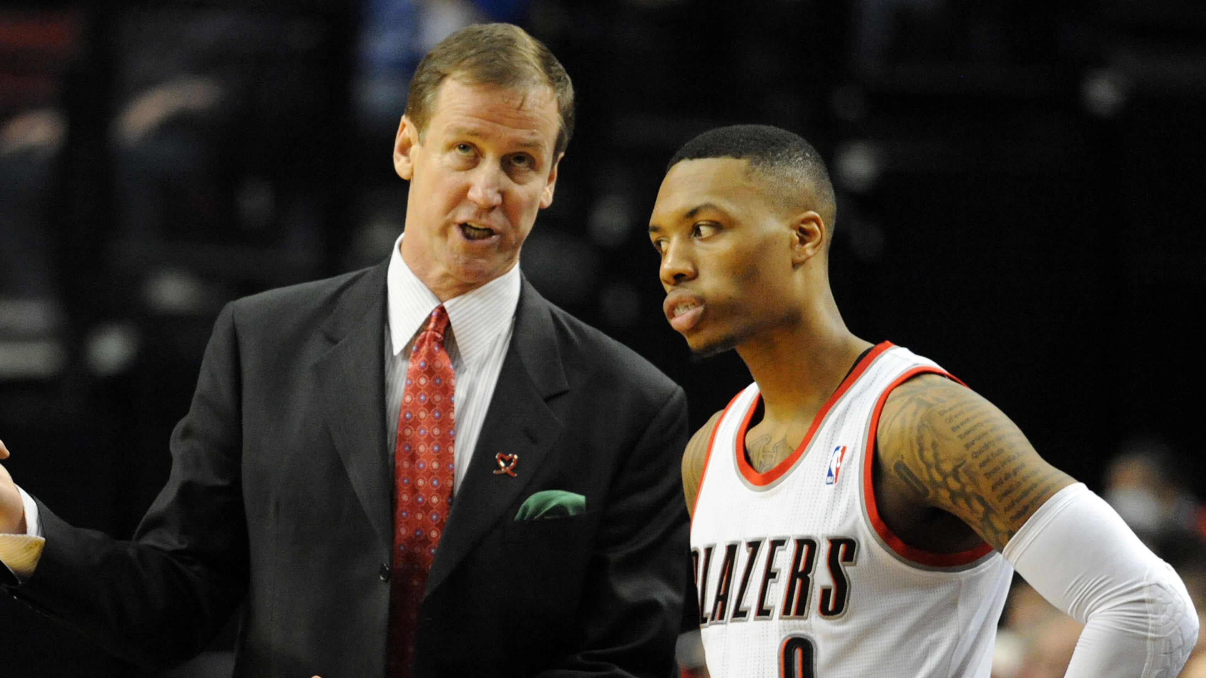 Terry Stotts, left (with guard Damian Lillard), previously held head coaching jobs with the Hawks and Milwaukee, and was fired from both of them. He's now making the most of his opportunity with Portland.