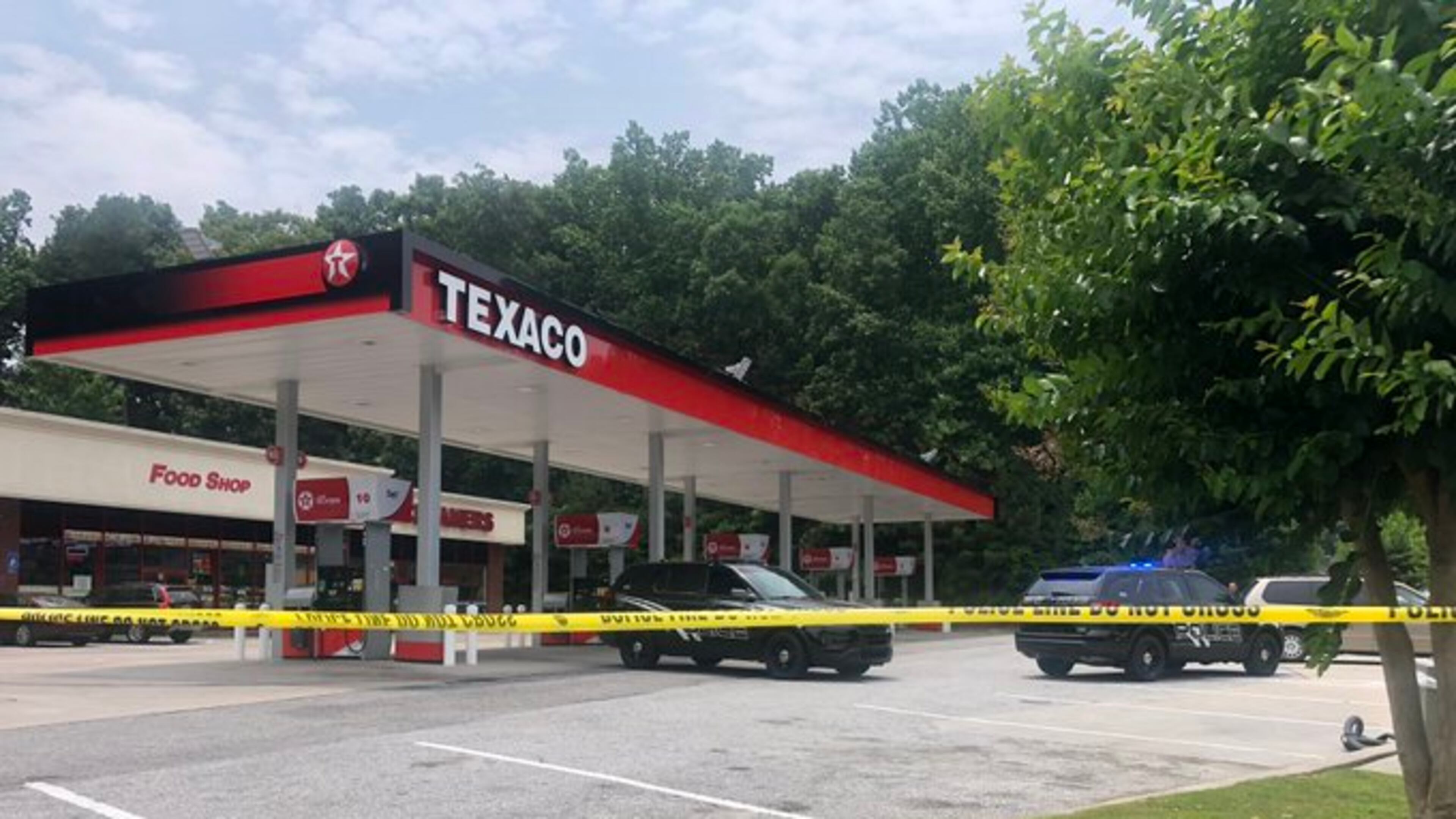 A man drove himself to this Texaco gas station at the intersection of Oakley and Flat Shoals roads, where police say he collapsed and died. He’d been shot at a nearby apartment complex, Channel 2 Action News reported.