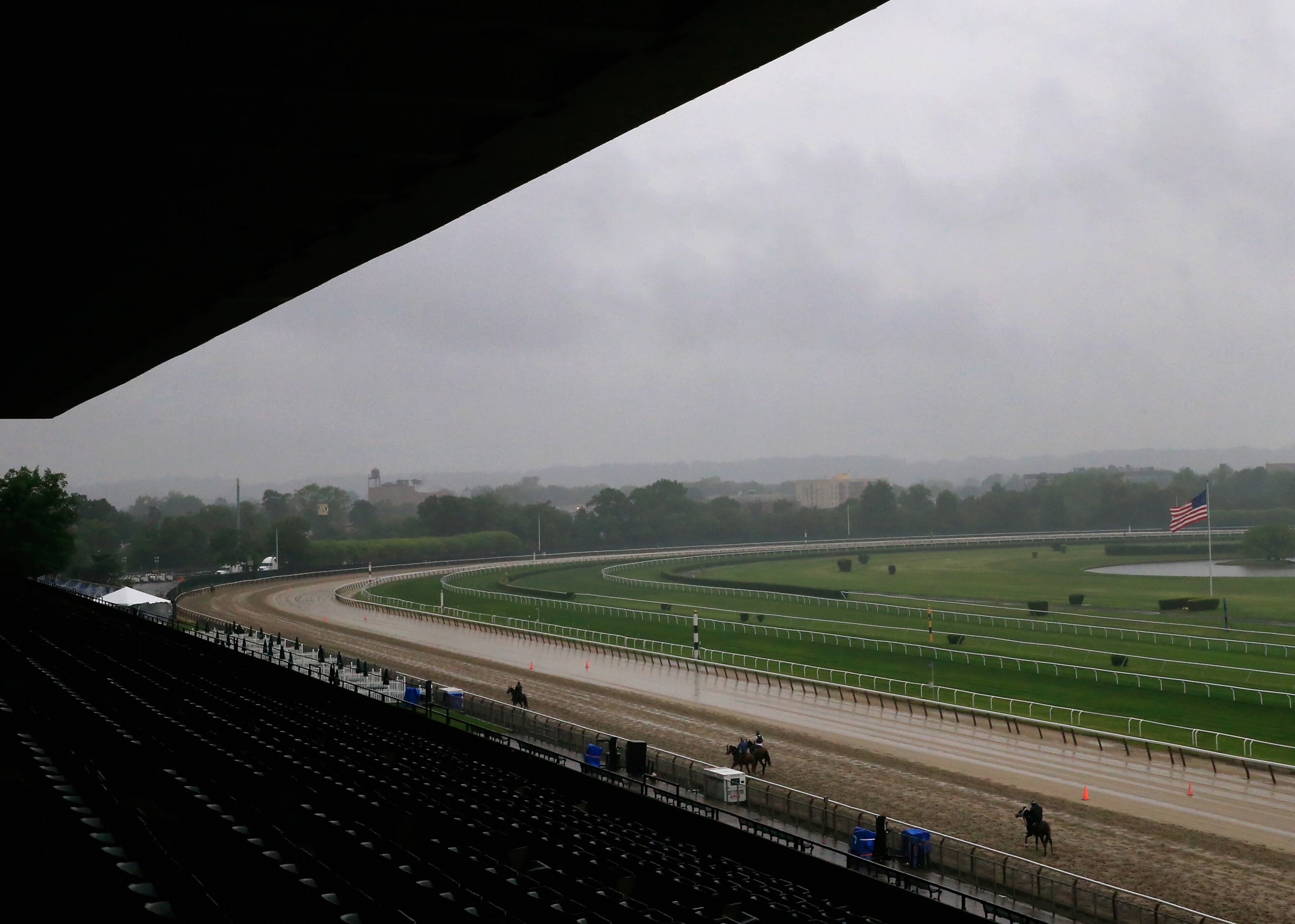 ELMONT, NY - JUNE 05: Horsess train on the track at Belmont Park on June 5, 2014 in Elmont, New York. The 146th running of the Belmont Stakes will be held Saturday. (Photo by Rob Carr/Getty Images)