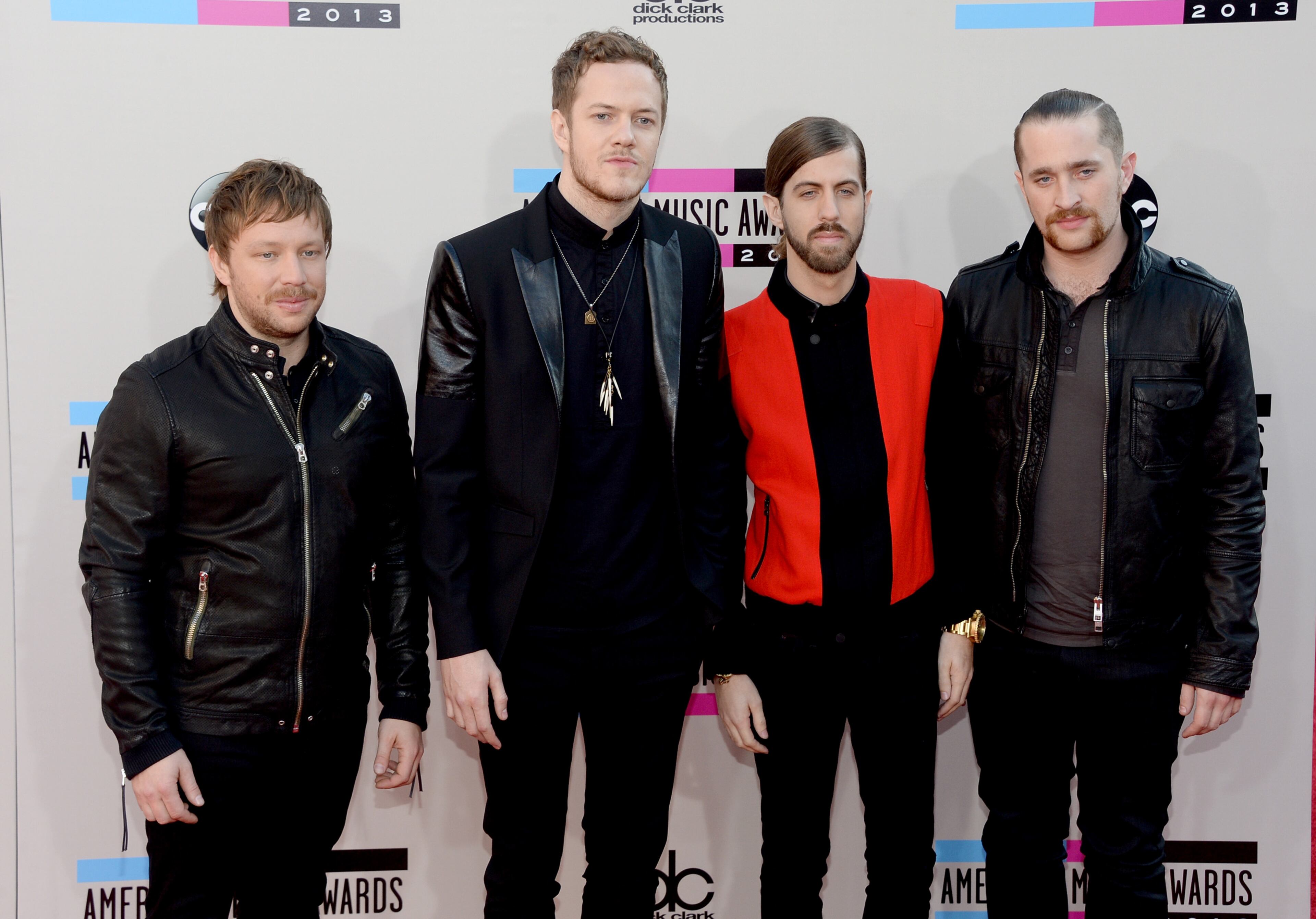LOS ANGELES, CA - NOVEMBER 24: Musicians (L-R) Ben McKee, Dan Reynolds, Dan Platzman, and Wayne Sermon of Imagine Dragons attend the 2013 American Music Awards at Nokia Theatre L.A. Live on November 24, 2013 in Los Angeles, California. (Photo by Jason Kempin/Getty Images)