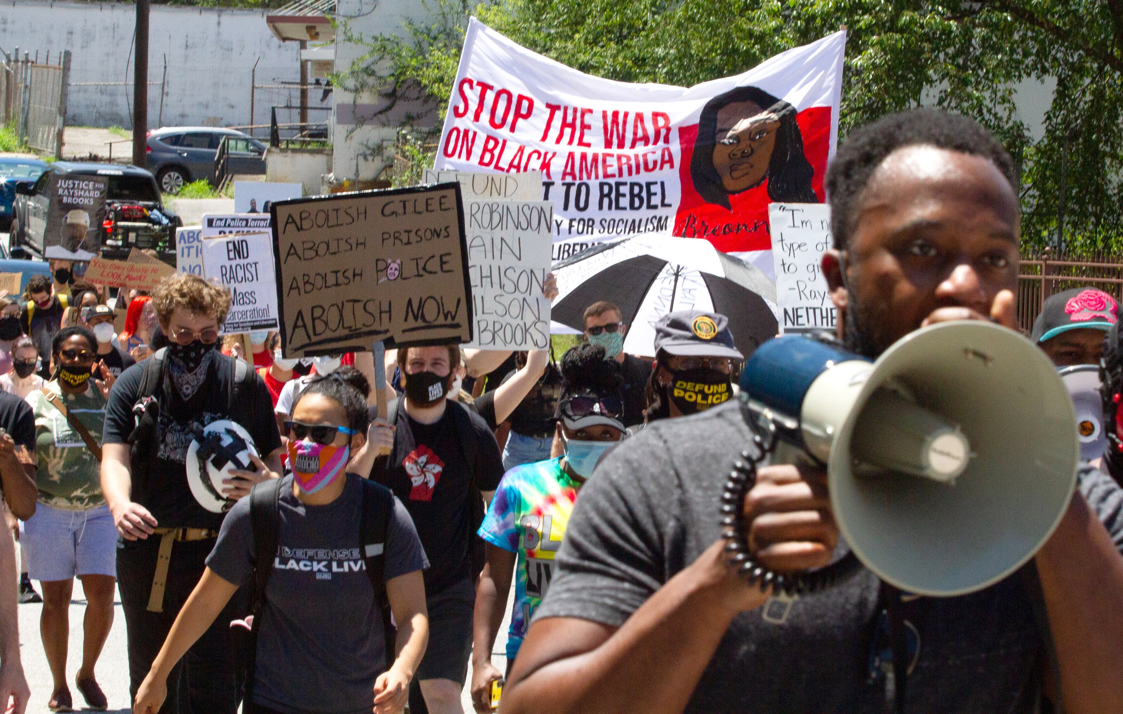 Marchers head towards the Wendy's on University Avenue. during the "Take Back the Wendy's" March & Rally in Atlanta on Saturday, July 11, 2020. The march started at the Community Movement Builders community house and ended at the Wendy's. STEVE SCHAEFER FOR THE ATLANTA JOURNAL-CONSTITUTION