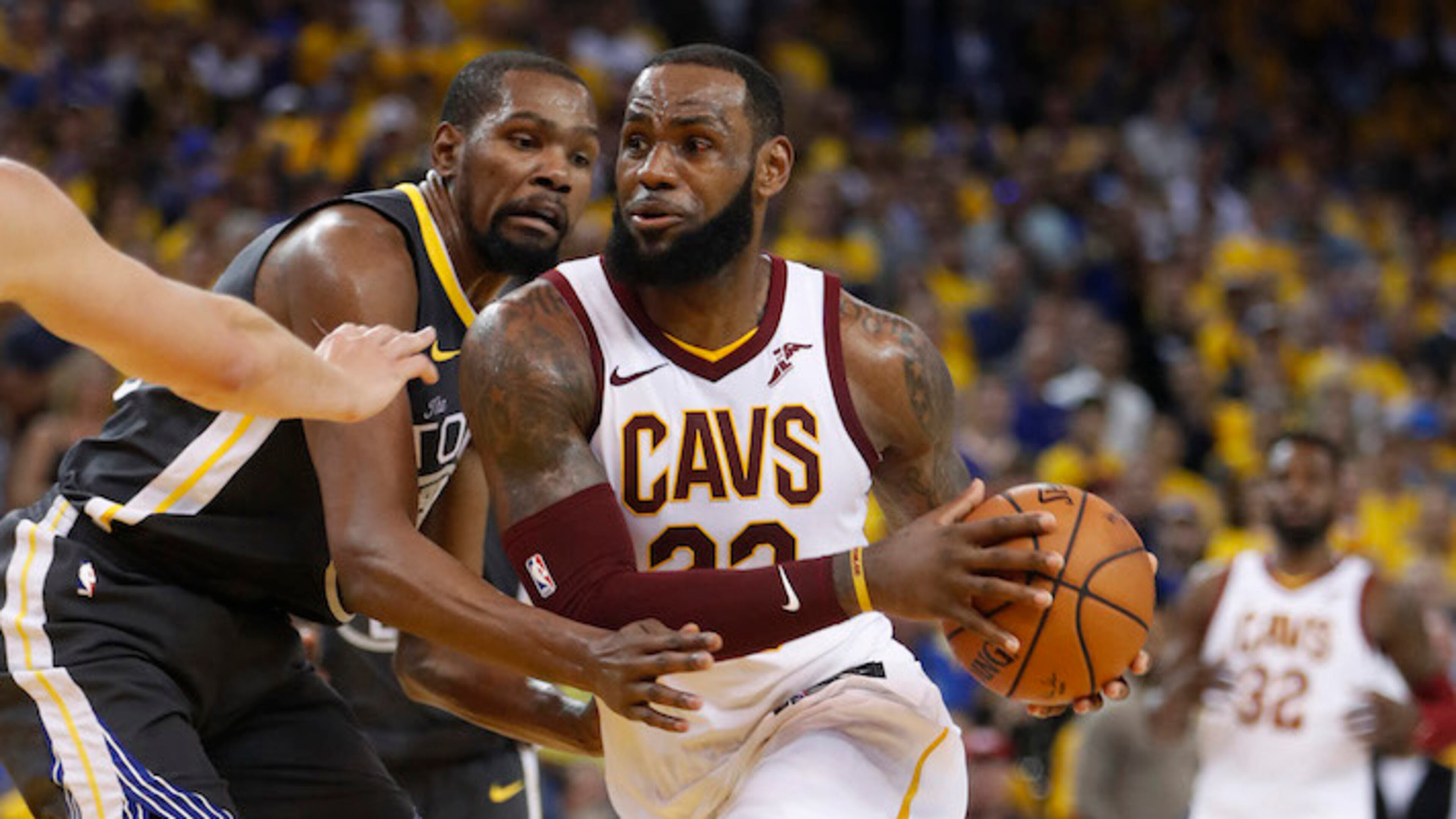 Cleveland Cavaliers' LeBron James (23) heads to the basket against Golden State Warriors' Kevin Durant (35) in the third quarter of Game 2 of the NBA Finals on Sunday, June 3, 2018 at Oracle Arena, in Oakland, Calif. (Nhat V. Meyer/Bay Area News Group/TNS)