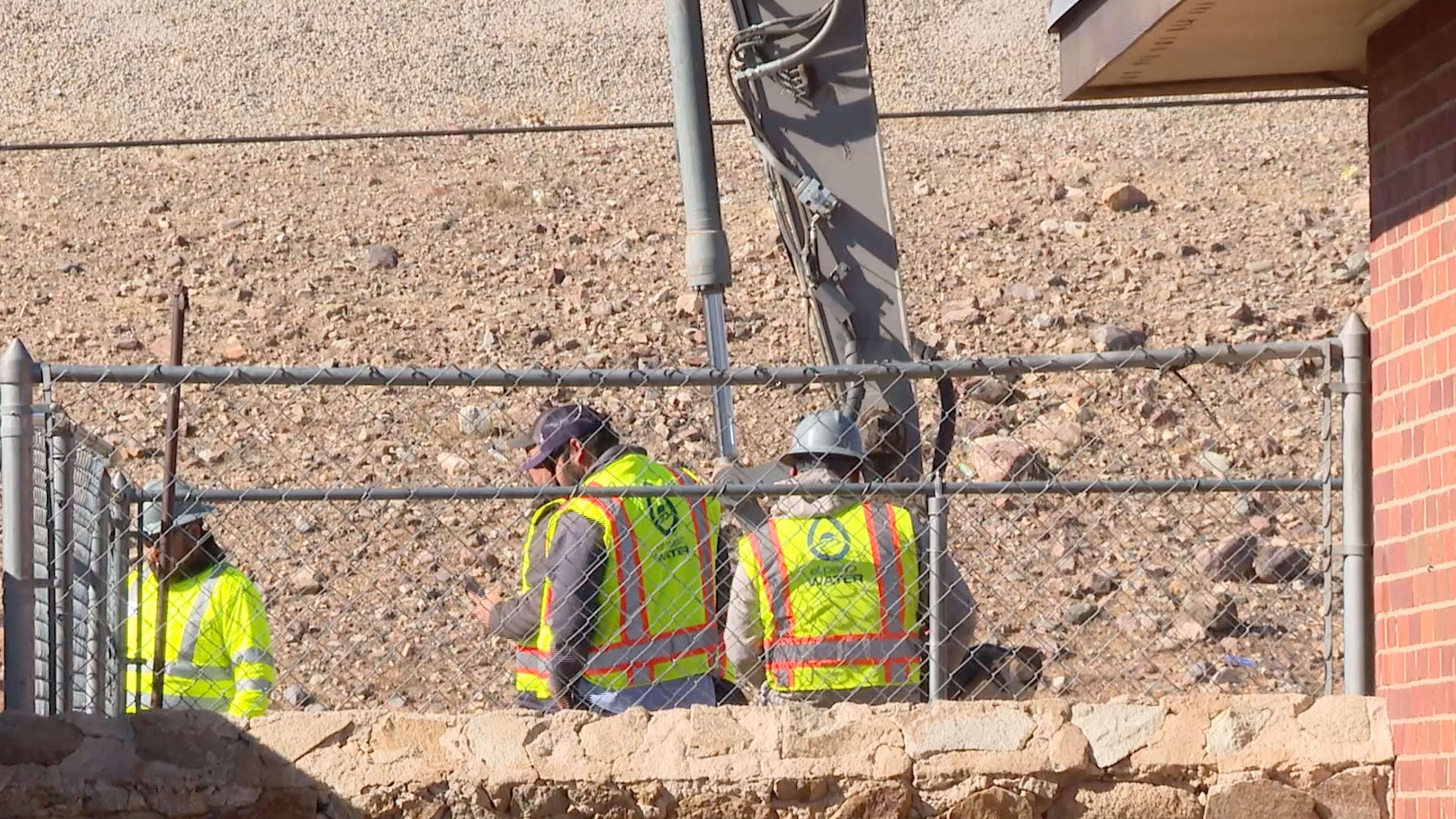 A still frame from video showed crews with El Paso Water working to restore services after a water main break on Sunday, Jan. 11, 2026, in El Paso, Texas. (KFOX News via AP)