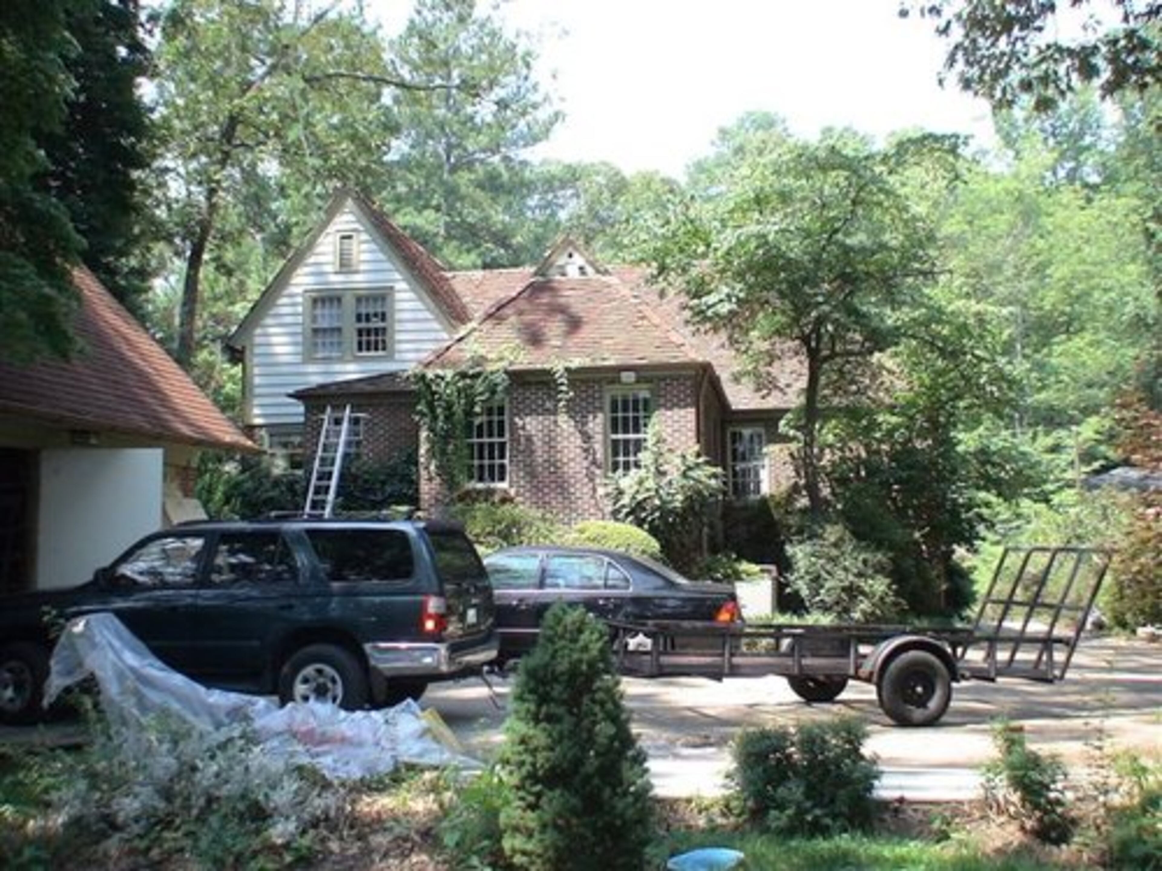 It took about three months to turn this parking pad into a pool area. BIGGEST CHALLENGE: "The garage, a 75-year-old structure, was in bad shape," Epperson said. "The challenge was taking 400 feet of really good space and trying to figure out how to make everything flow without boxing up the interior. That is why the flooring floats in from the edge of the pool. There is a seamless, graceful falling off into the water."