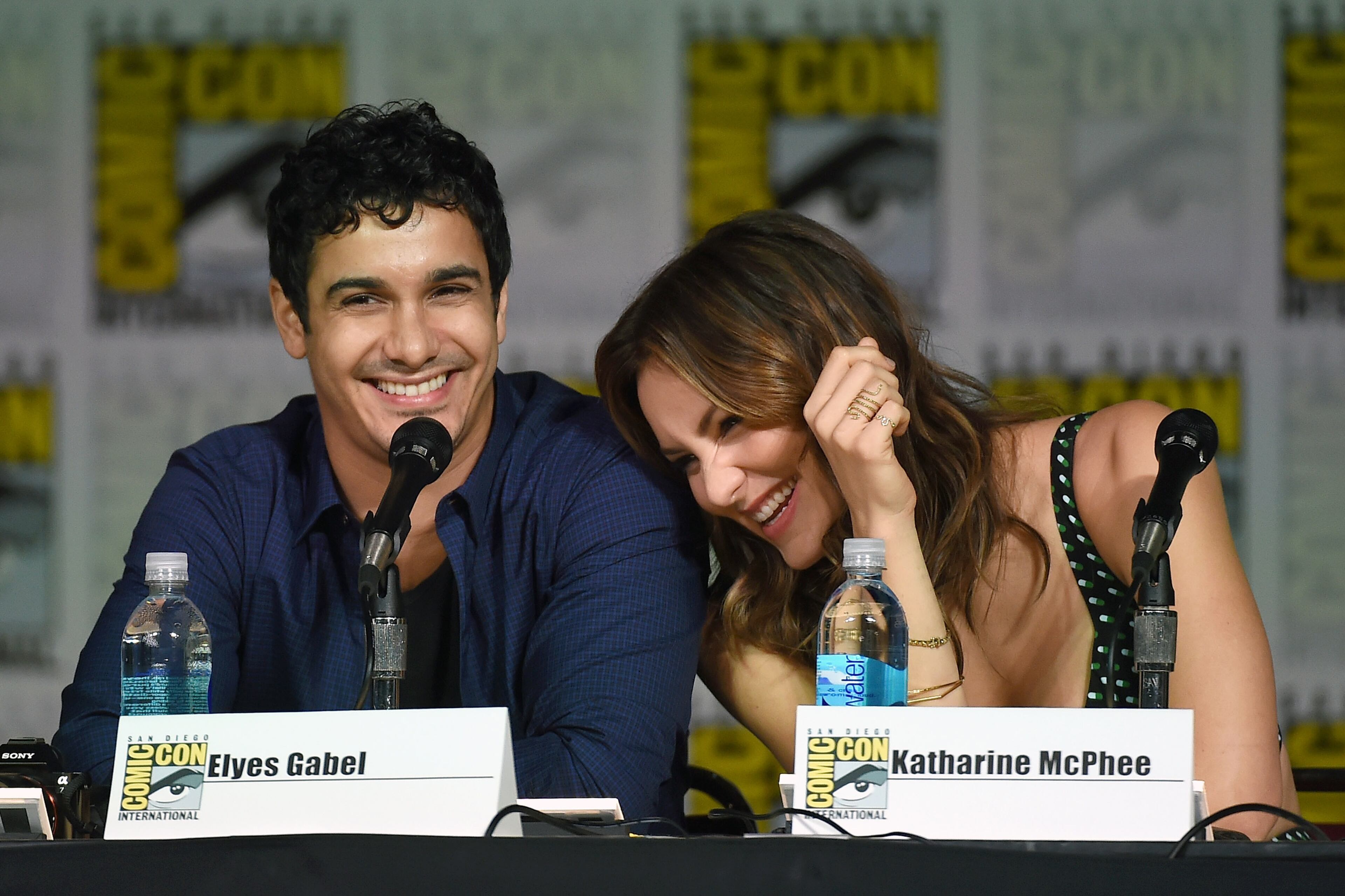 SAN DIEGO, CA - JULY 09: Actor Elyes Gabel (L) and actress/singer Katharine McPhee laugh as they attend CBS TV Studios' panel for "Scorpion" during Comic-Con International 2015 at the San Diego Convention Center on July 9, 2015 in San Diego, California. (Photo by Ethan Miller/Getty Images)