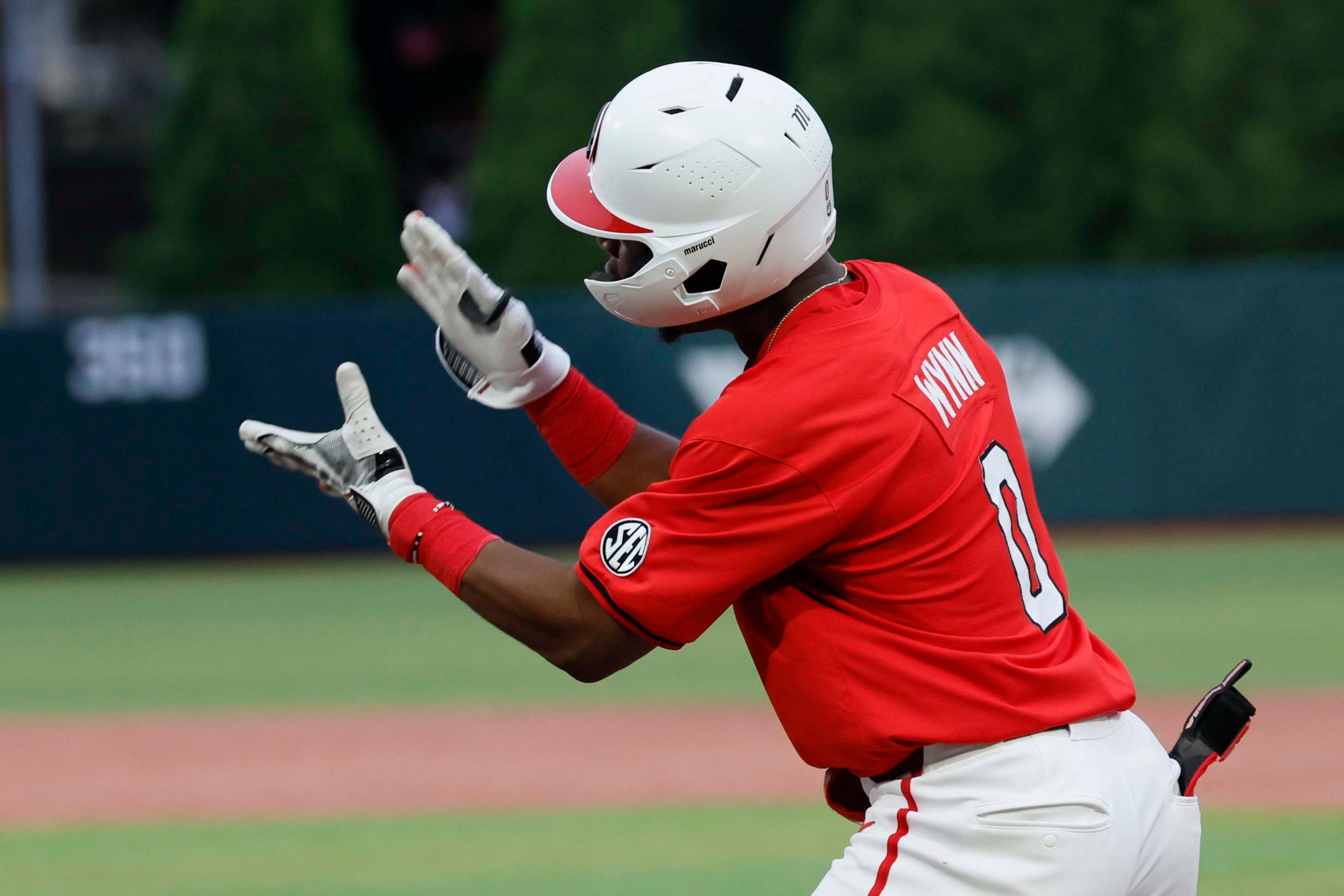 Ryan Wynn reacts after his two-RBI single in the eighth inning of the NCAA Regional final at Foley Field on Sunday, May 31, 2026, in Athens.(Miguel Martinez/AJC)