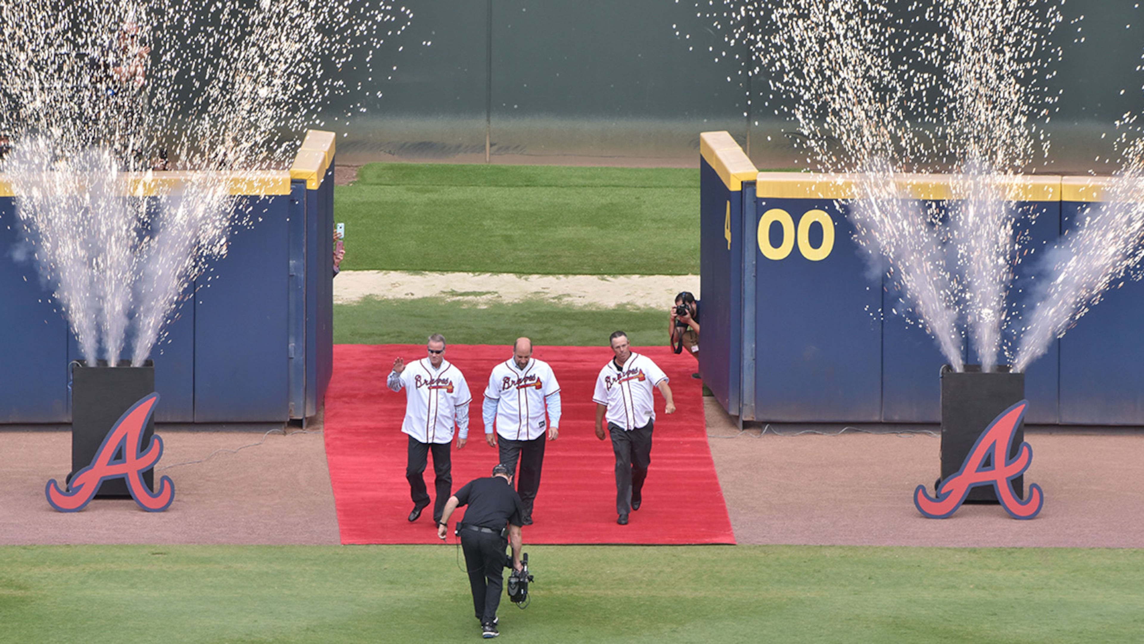 October 2, 2016 Atlanta - Longtime Atlanta Braves pitcher Tom Glavine, John Smoltz and Greg Maddux walk onto the field during pregame ceremony before the final Atlanta Braves game against the Detroit Tigers at Turner Field on Sunday, October 2, 2016. HYOSUB SHIN / HSHIN@AJC.COM